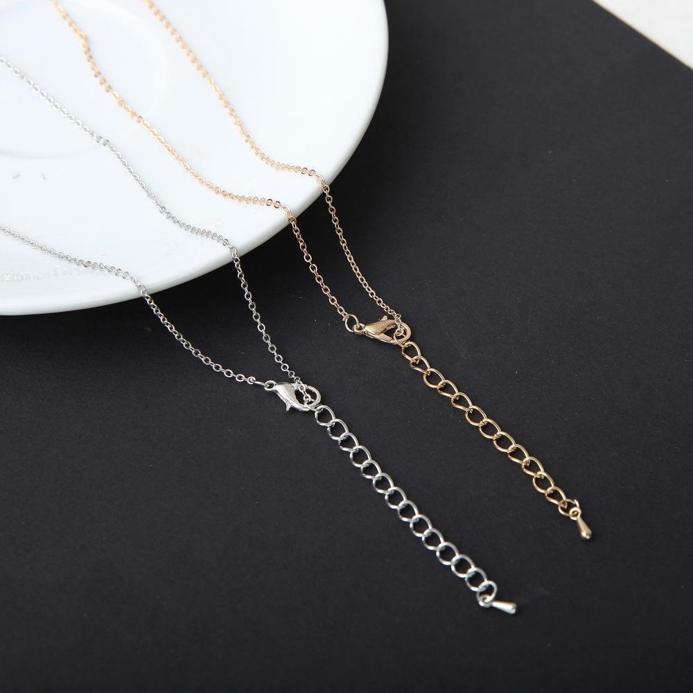 A beautiful Moon and Star Necklace featuring a delicate design with adjustable length, crafted from high-quality zinc alloy.