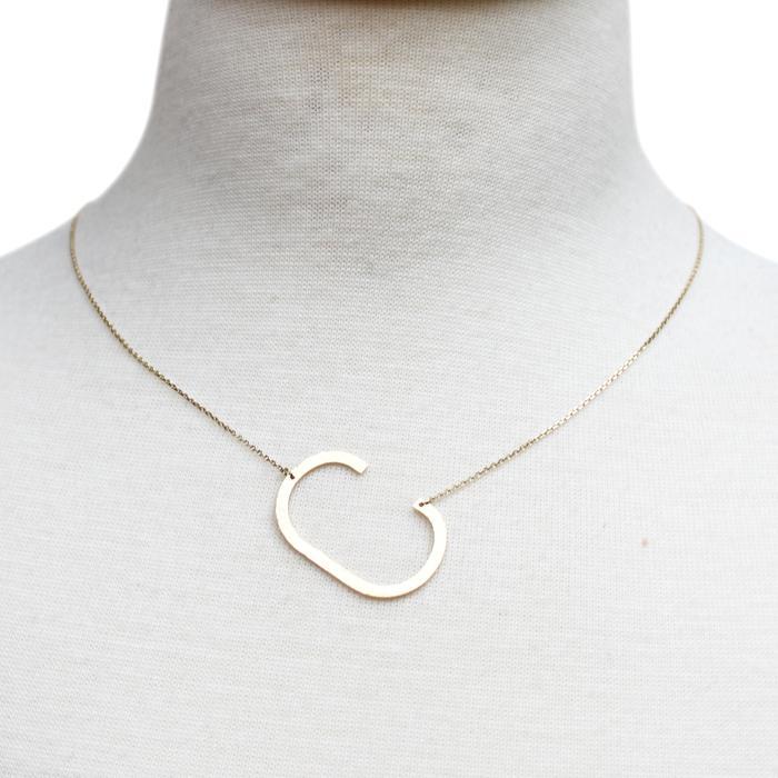 Gold-dipped brass Monogram Collection Initial Necklace with adjustable chain and elegant design.