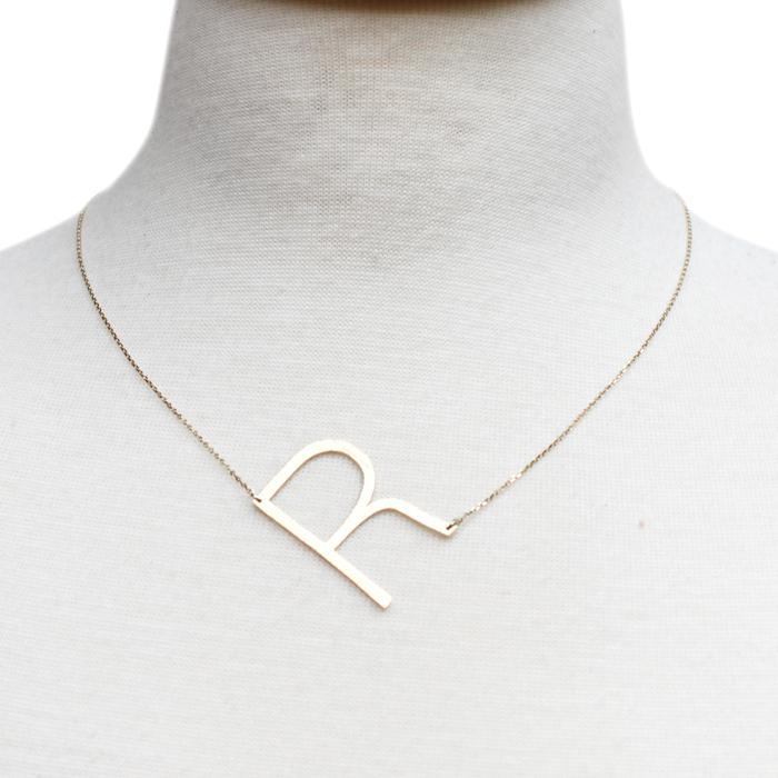 Gold-dipped brass Monogram Collection Initial Necklace with adjustable chain and elegant design.