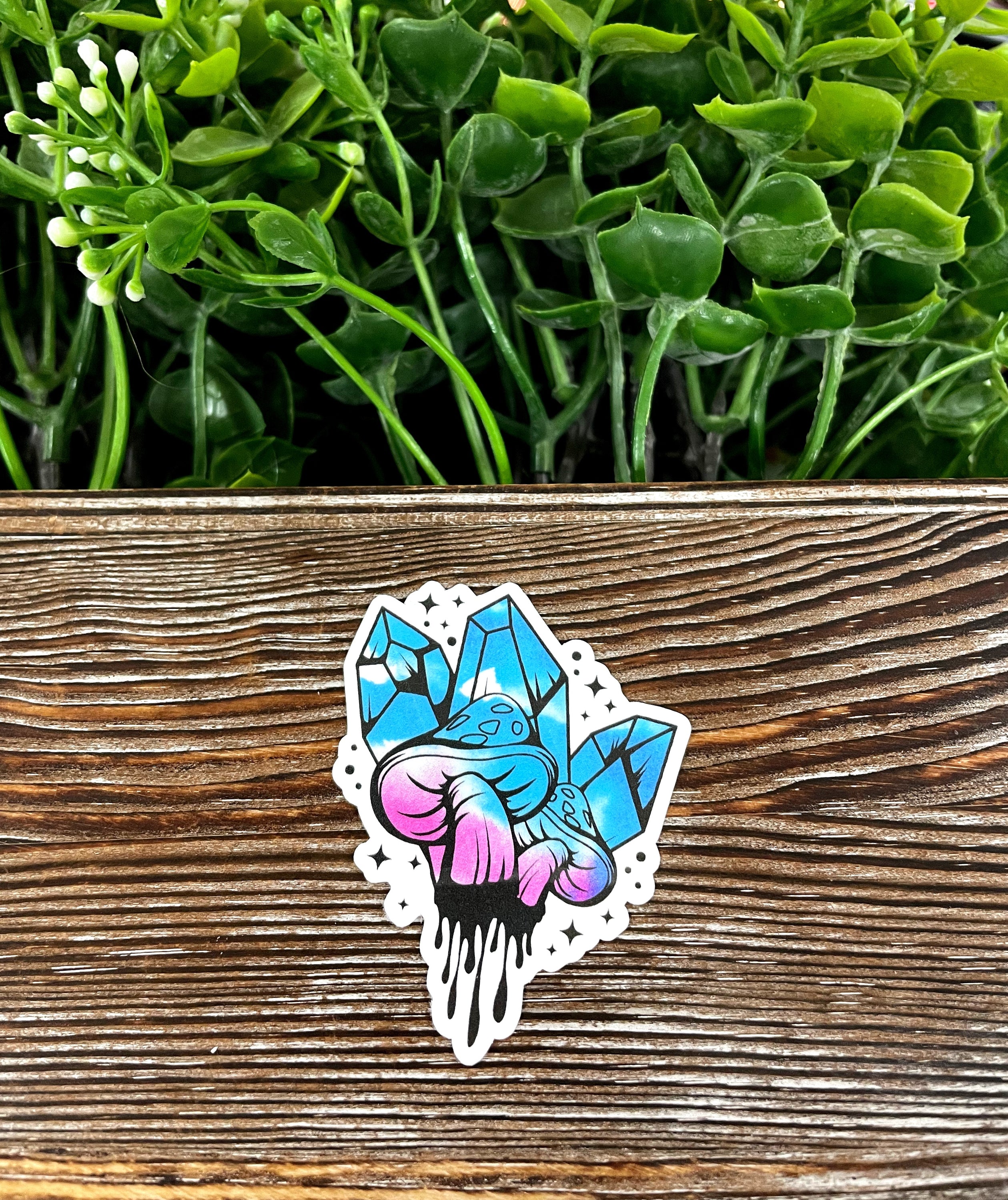 Sticker of mushrooms and crystals.