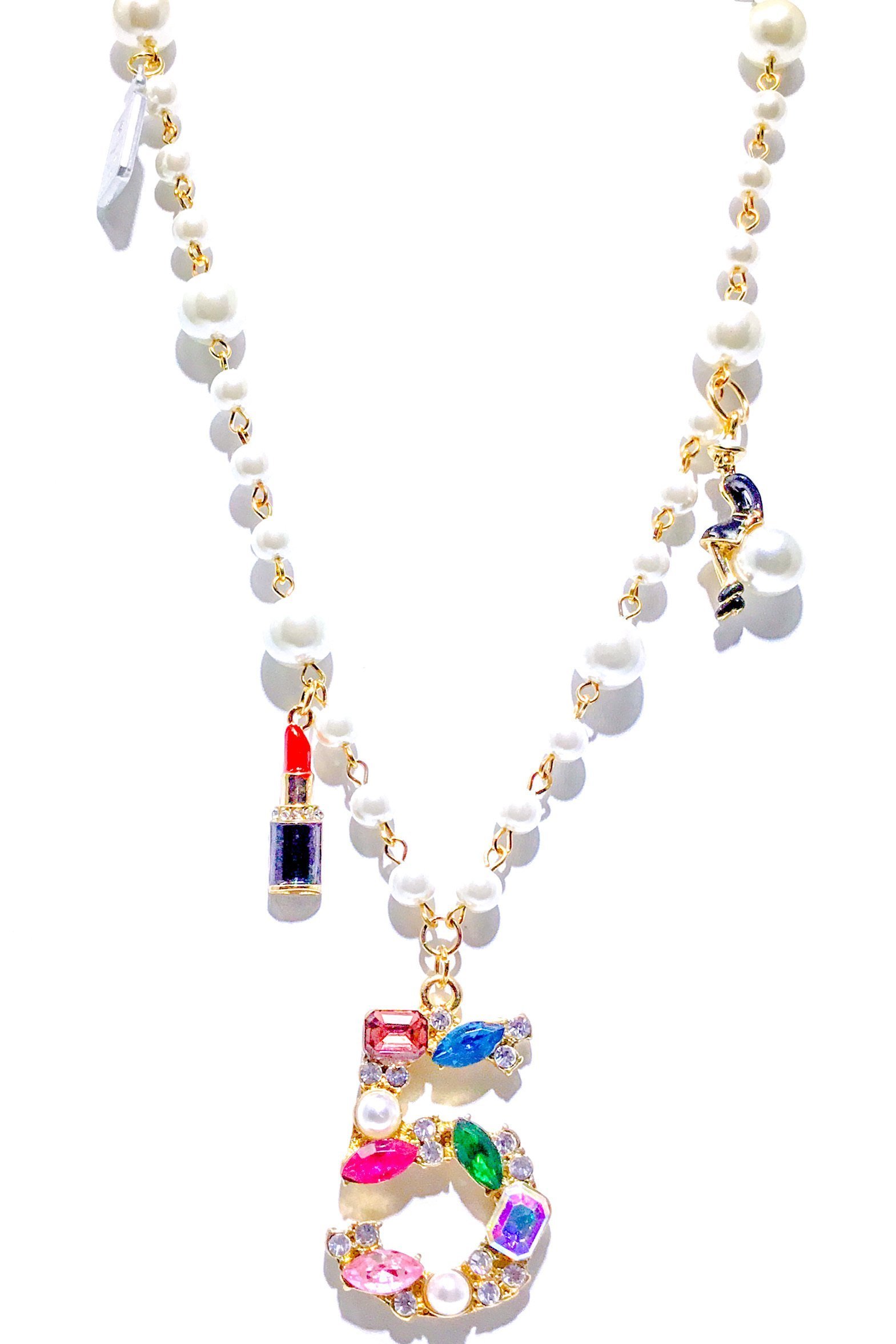 Kensington Necklace featuring embellished pearl strands in gold and multi colors, showcasing elegance and style.