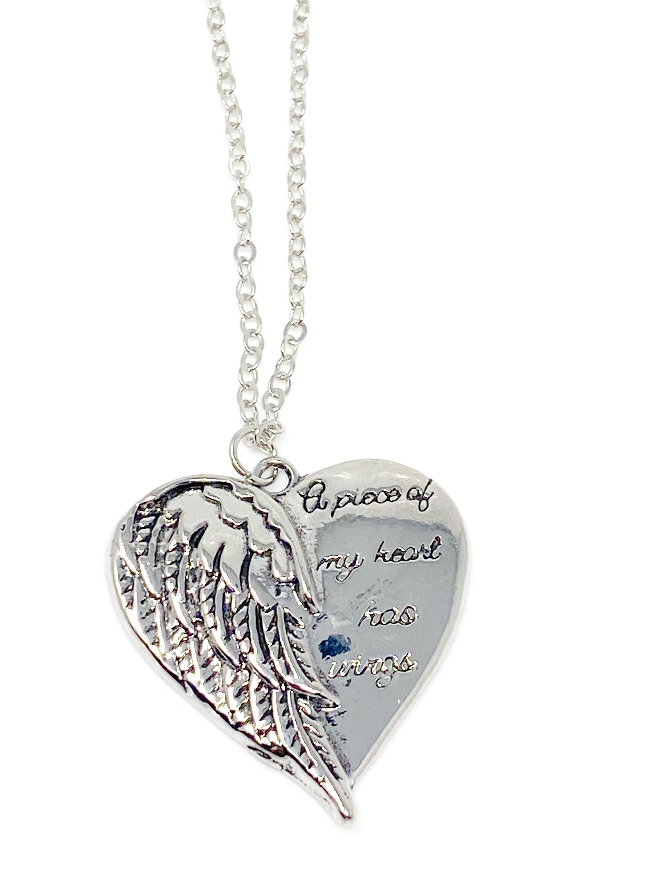 A silver remembrance necklace featuring wings, symbolizing love and memory, crafted from high-quality zinc alloy.