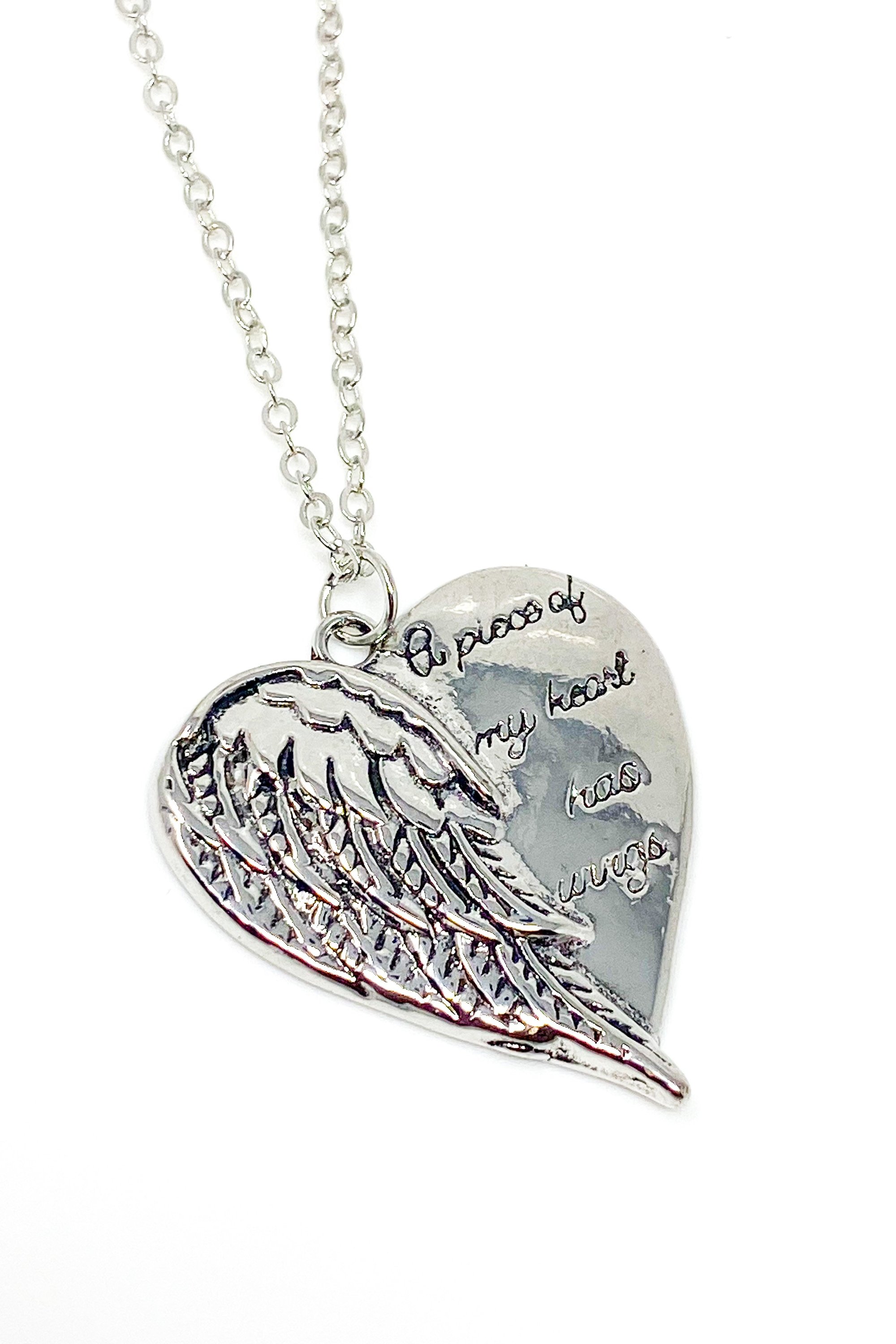 A silver remembrance necklace featuring wings, symbolizing love and memory, crafted from high-quality zinc alloy.