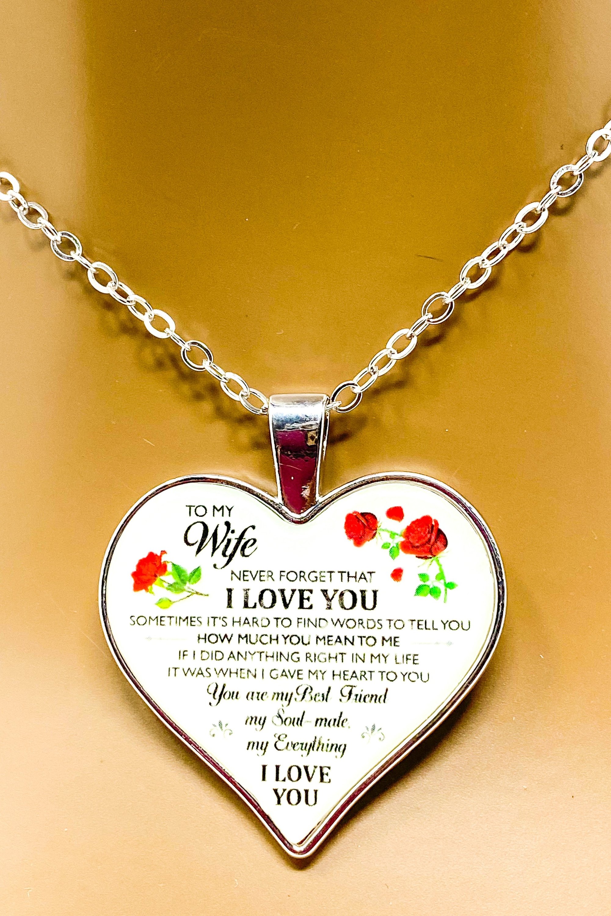 To My Wife Heart Keepsake Necklace in silver, elegantly displayed in a gift box with purple velvet inset.