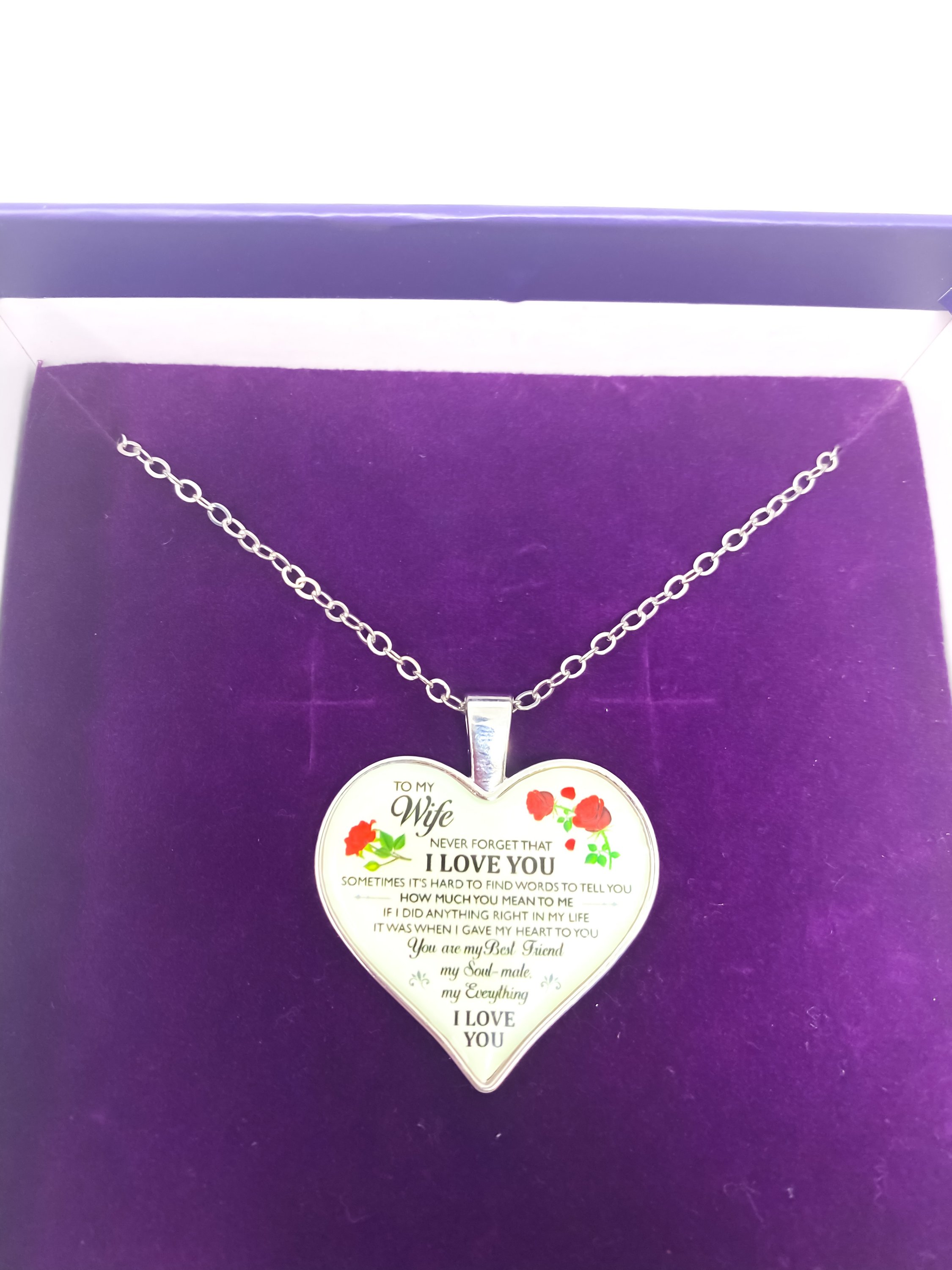 To My Wife Heart Keepsake Necklace in silver, elegantly displayed in a gift box with purple velvet inset.