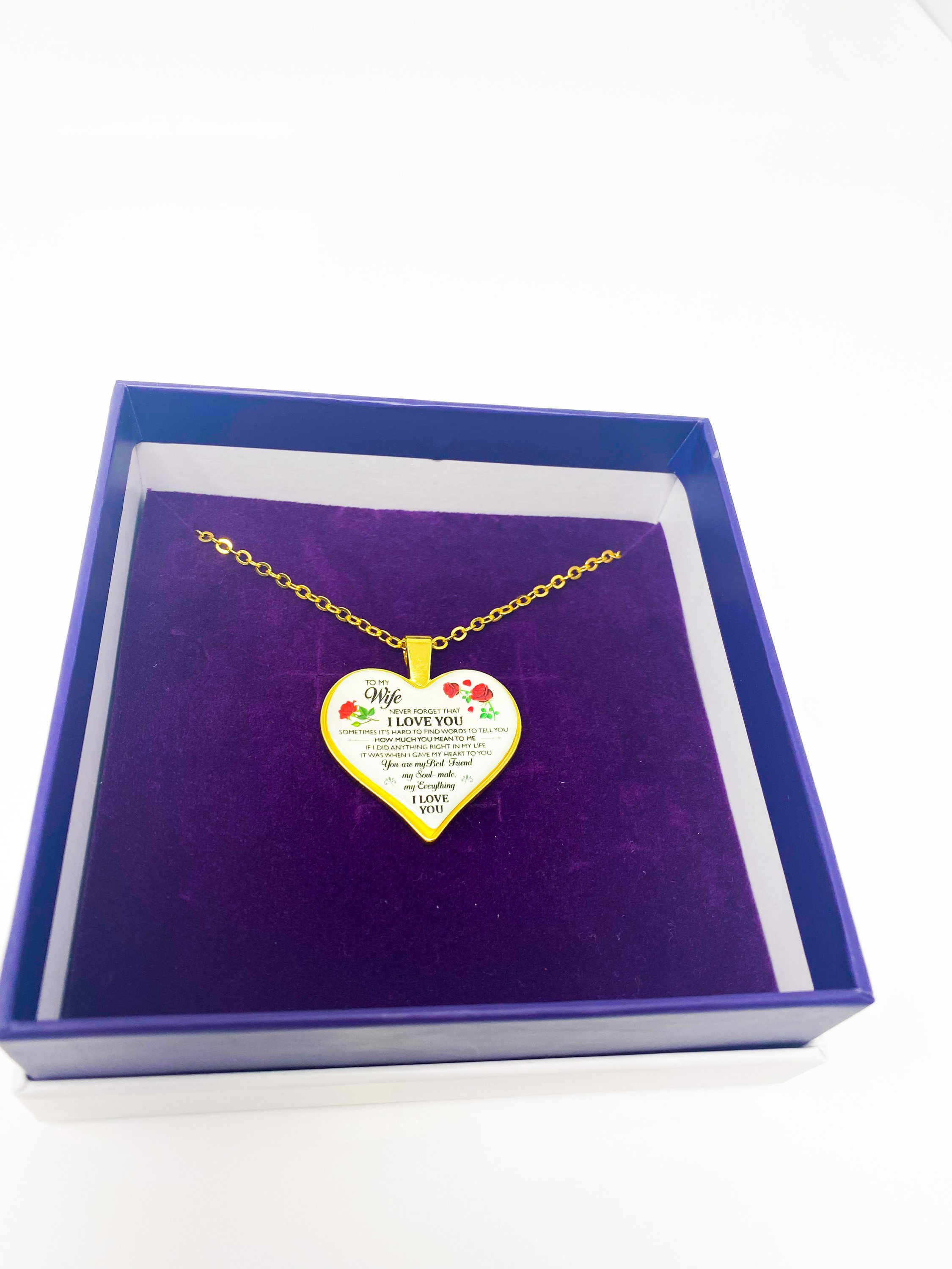 To My Wife Heart Keepsake Necklace in silver, elegantly displayed in a gift box with purple velvet inset.