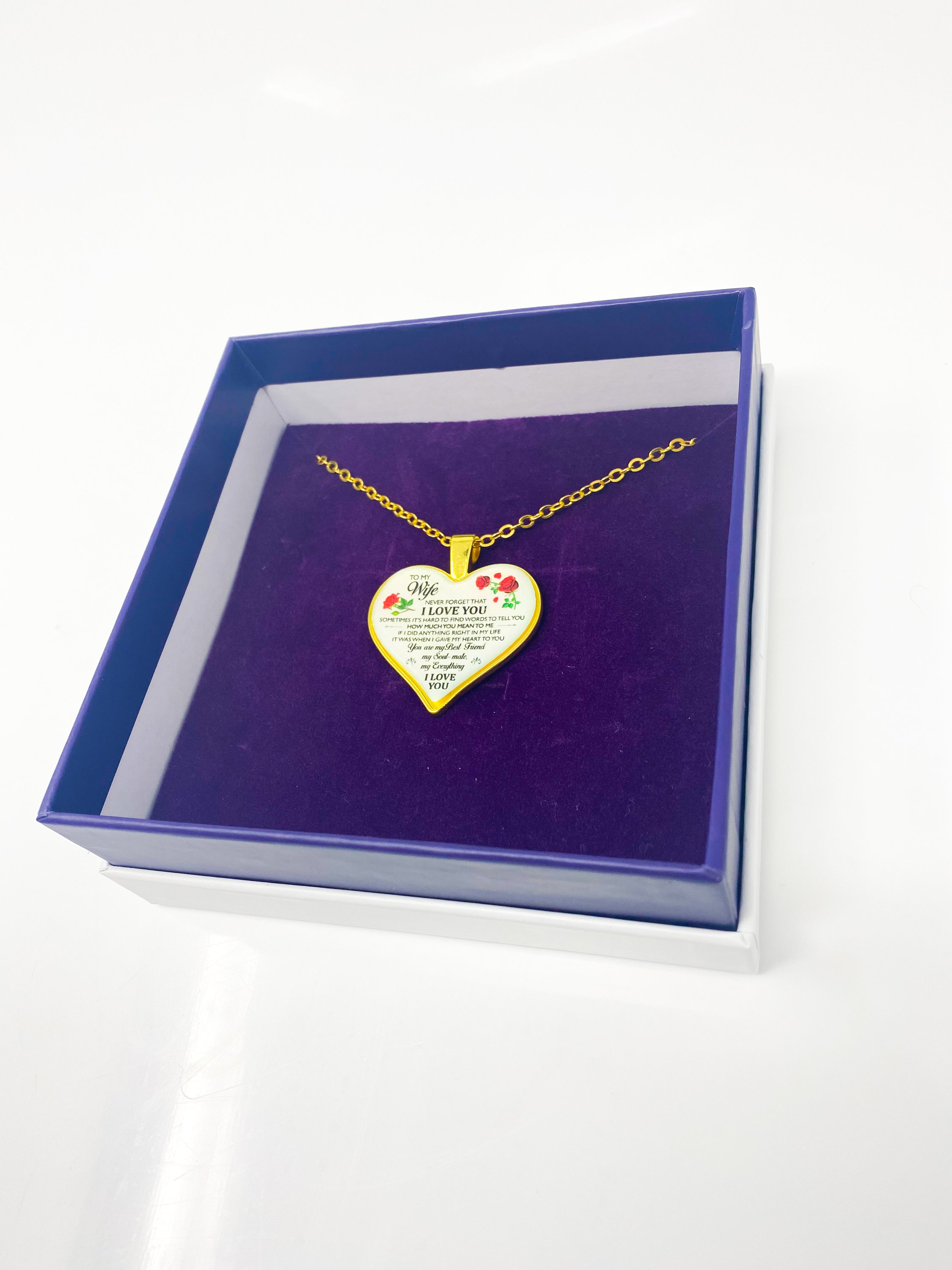 To My Wife Heart Keepsake Necklace in silver, elegantly displayed in a gift box with purple velvet inset.