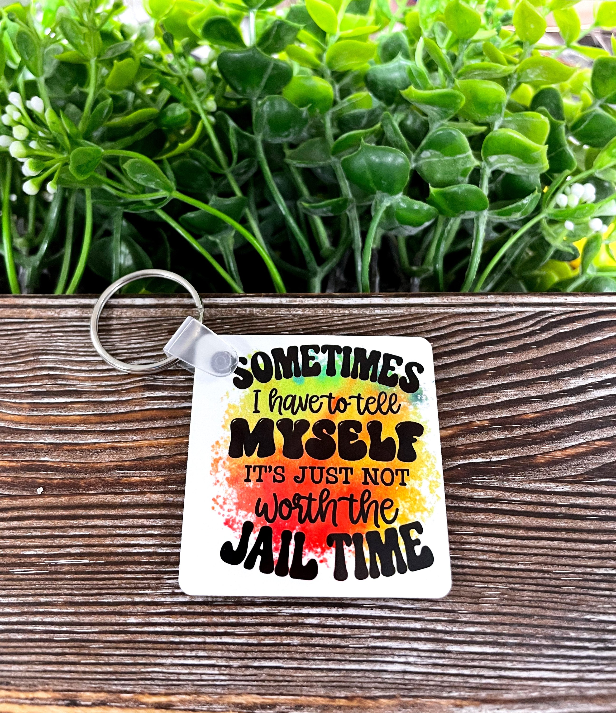 Not Worth the Jail Time MDF Square Keychain featuring vibrant colors and a fun design, perfect for boho style enthusiasts.