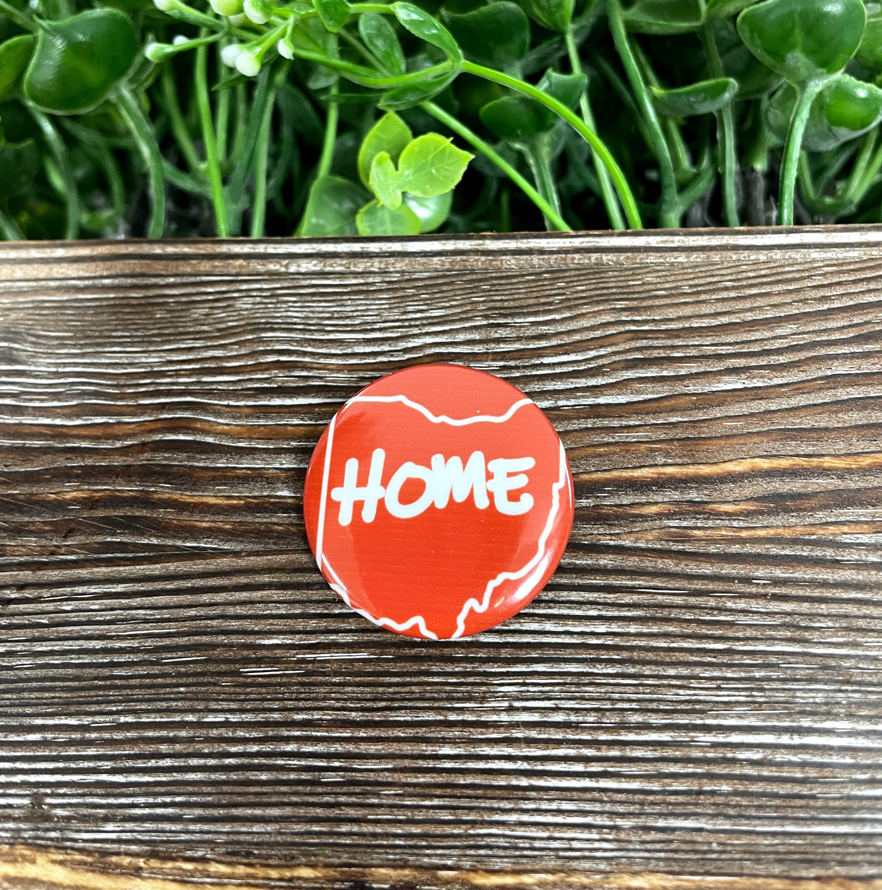 Ohio Home graphic art button with a vibrant red background, measuring 1.25 inches, showcasing state pride.