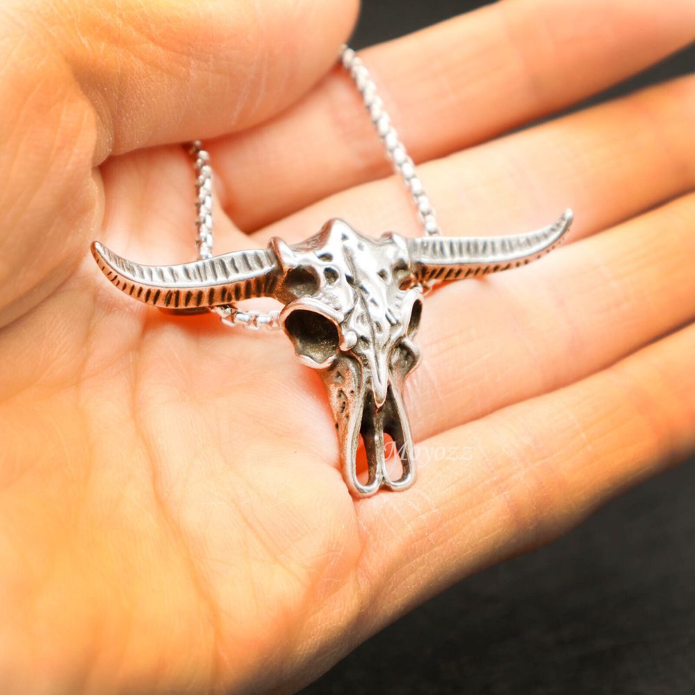 Ox Head Pendant Necklace made of stainless steel with a rope chain, featuring an intricate ox head design.