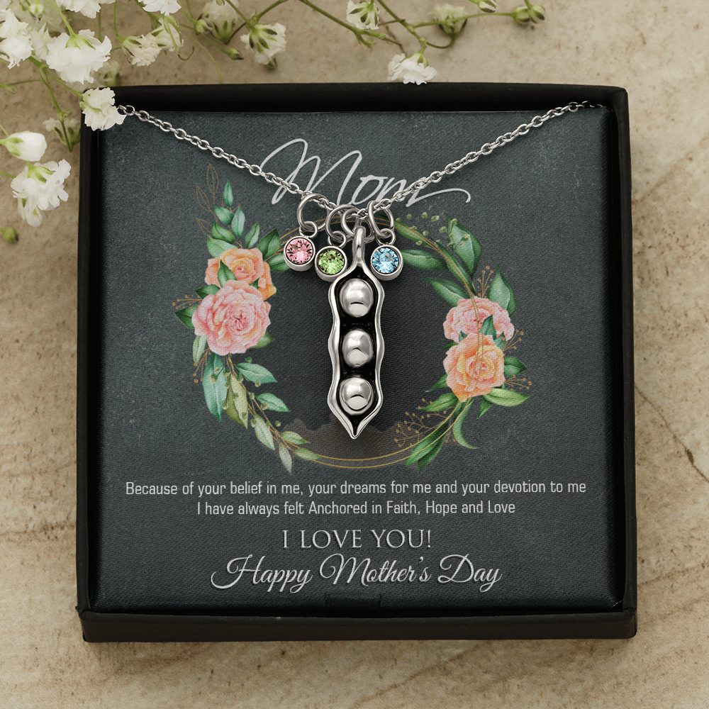 A beautiful Peas In A Pod Necklace featuring customizable peas and sparkling Swarovski® birthstones, crafted in 14K White Gold over Stainless Steel.