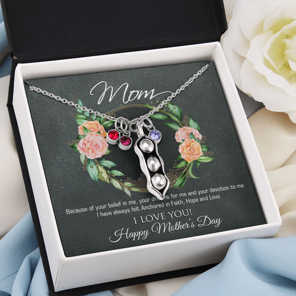 A beautiful Peas In A Pod Necklace featuring customizable peas and sparkling Swarovski® birthstones, crafted in 14K White Gold over Stainless Steel.