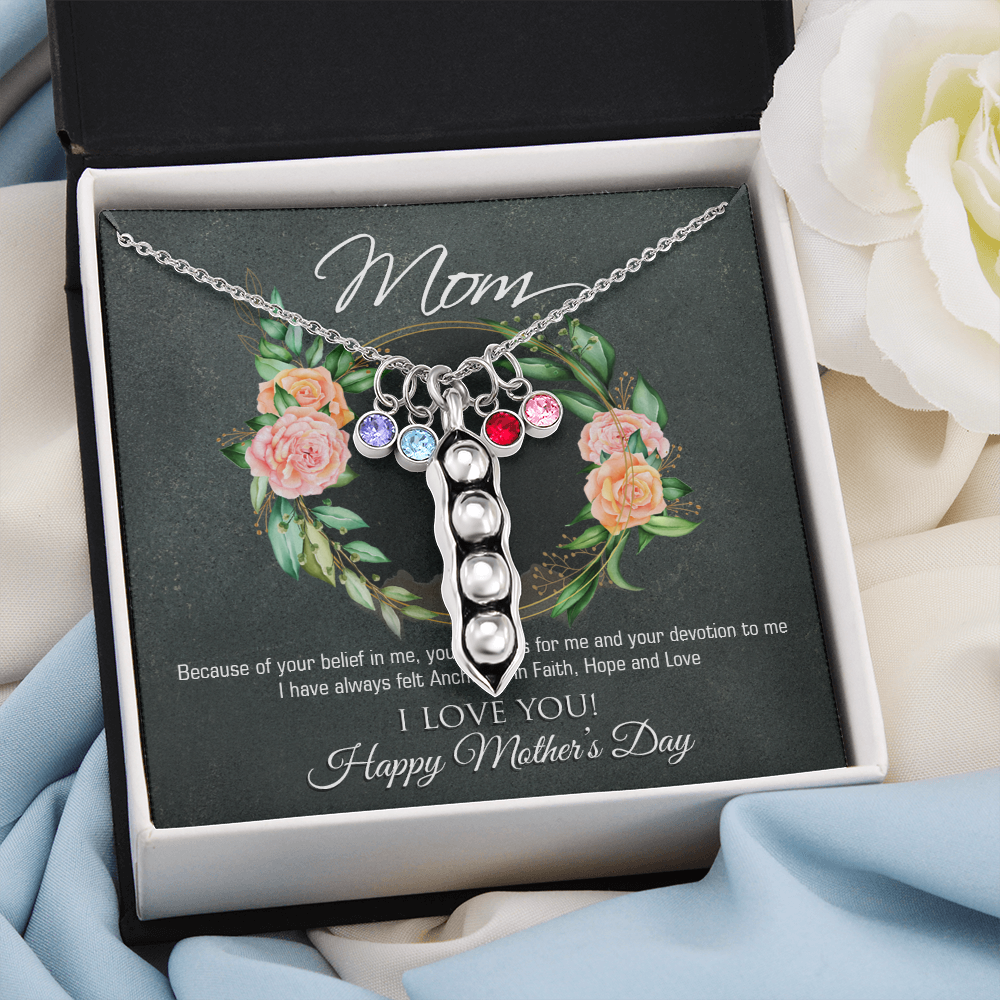 A beautiful Peas In A Pod Necklace featuring customizable peas and sparkling Swarovski® birthstones, crafted in 14K White Gold over Stainless Steel.