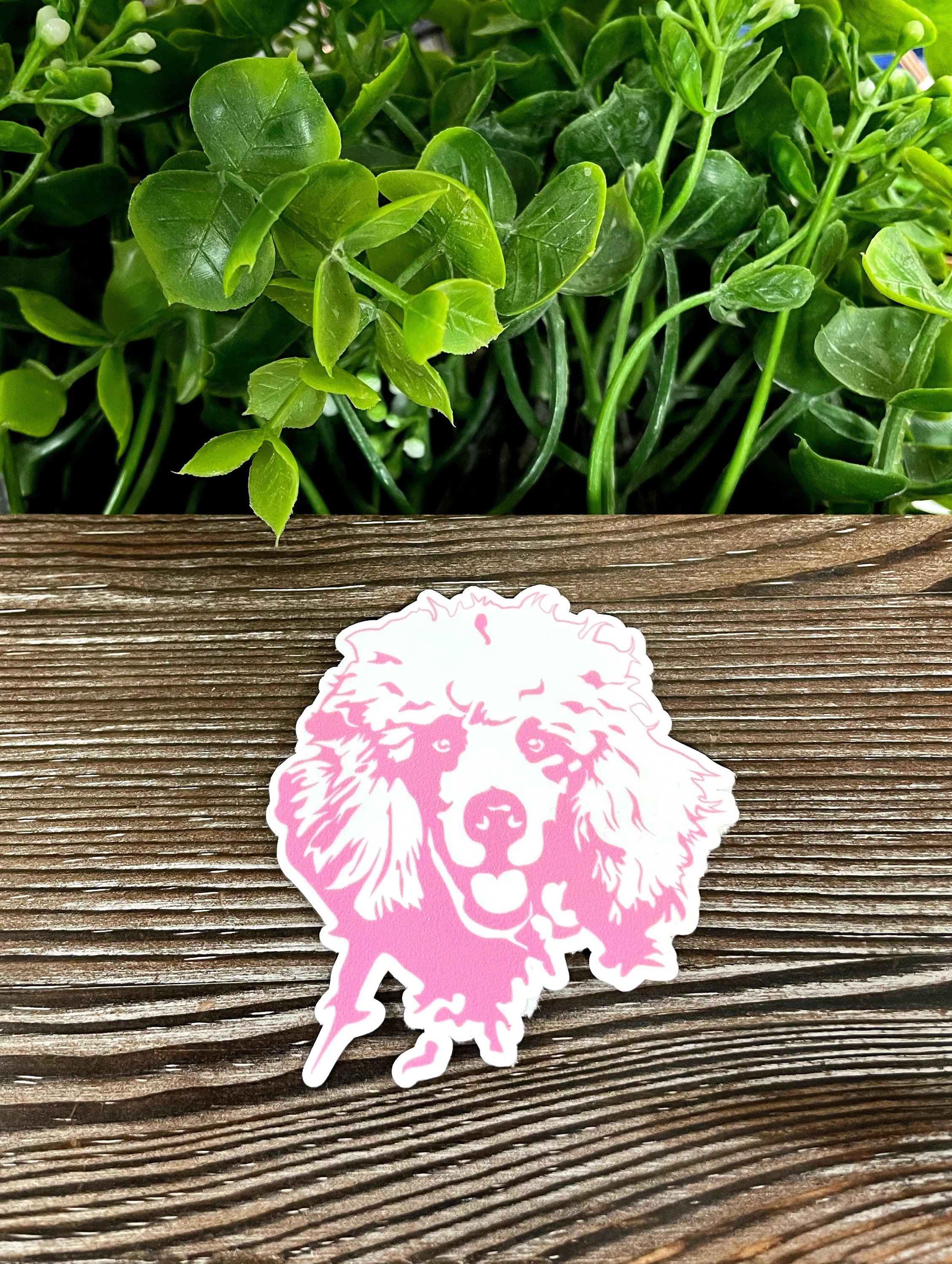 A vibrant pink poodle sticker with a glossy finish, perfect for personalizing various surfaces.