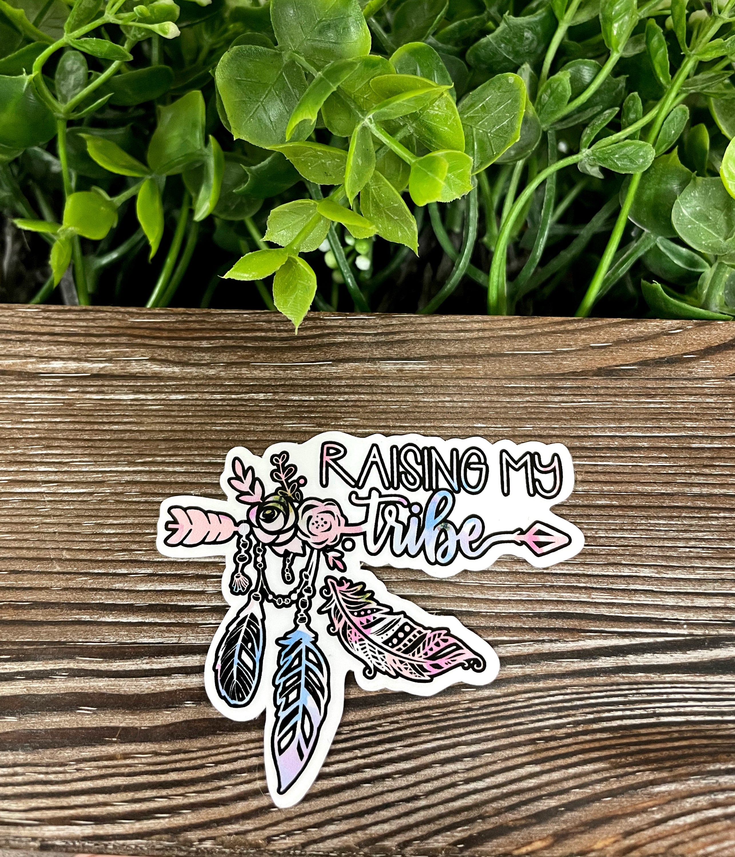 Raising My Tribe Sticker featuring vibrant colors and a die-cut design, perfect for personalizing various surfaces.