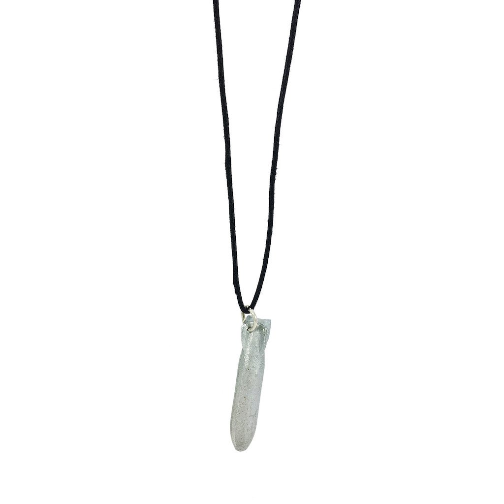 Recycled Bomb Pendant Necklace made from aluminum bomb parts, featuring an adjustable cord in olive green, black, or red, symbolizing peace and resilience.