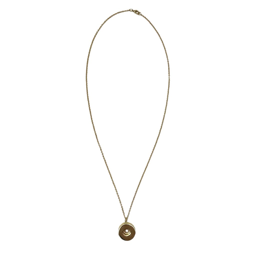 A stylish Shell Casing Pendant Necklace made from recycled bullet casings, featuring a gold plated chain, showcasing unique craftsmanship.