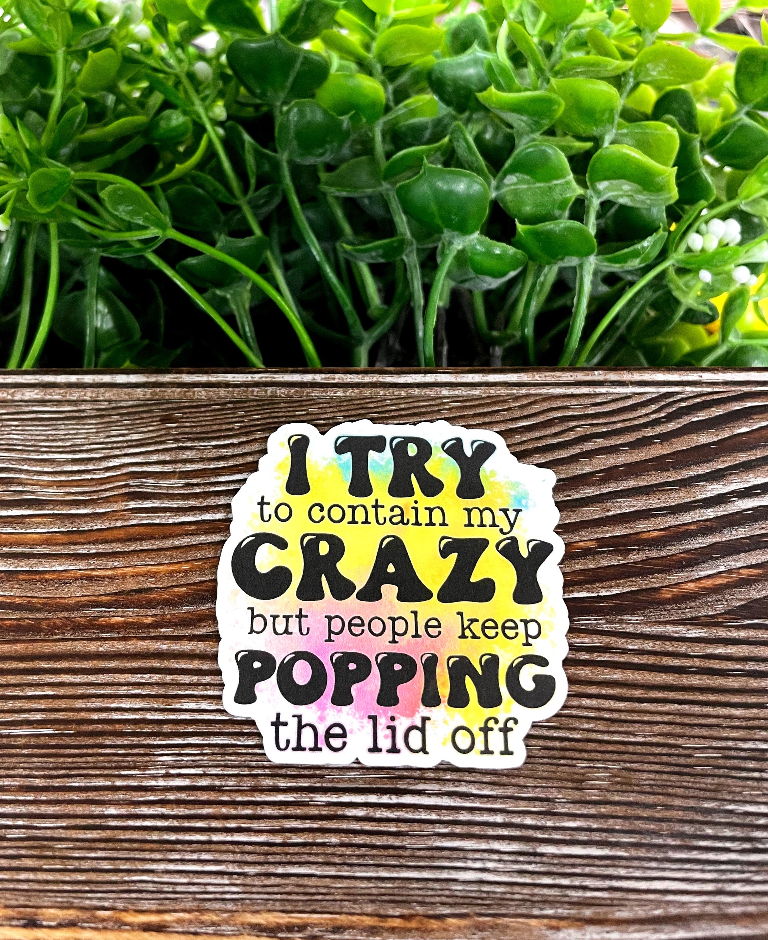 Snarky Sarcasm Quote die cut vinyl sticker on a smooth surface, showcasing vibrant colors and a fun design.