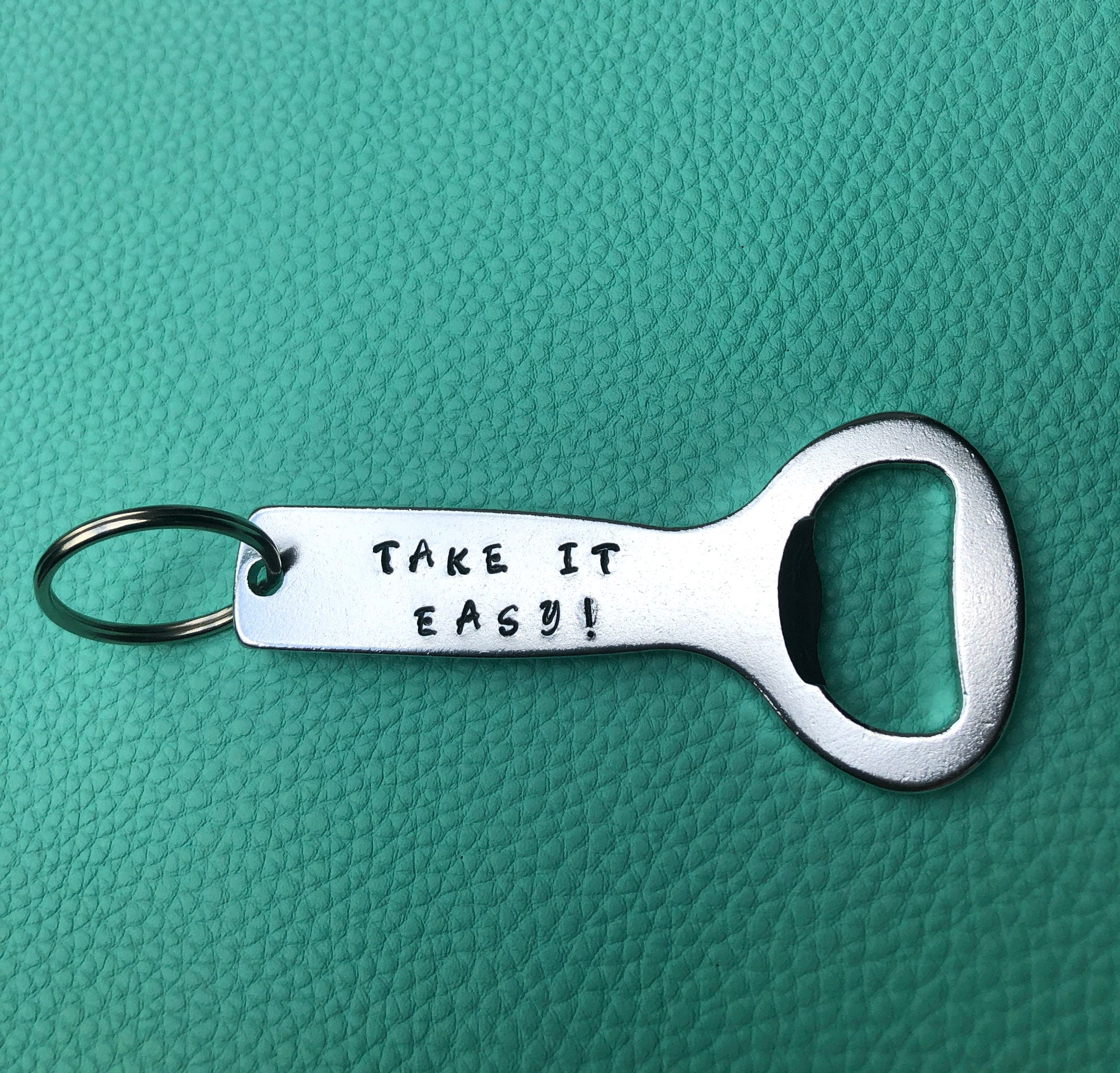 Handmade Take It Easy Bottle Opener made from 1100 pure aluminum with unique metal stamping.