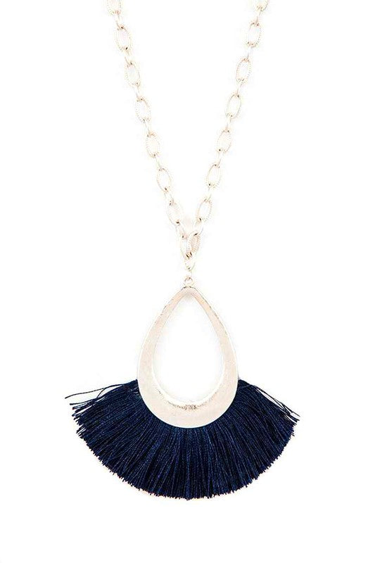 A stylish tassel teardrop pendant necklace featuring a long chain, perfect for adding elegance to any outfit.