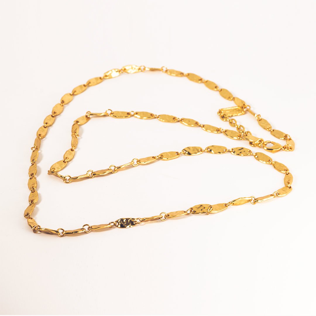 A stylish textured link long chain necklace with a high gloss finish, measuring 36 inches in length, featuring a lobster clasp and available in gold, silver, and rose gold.