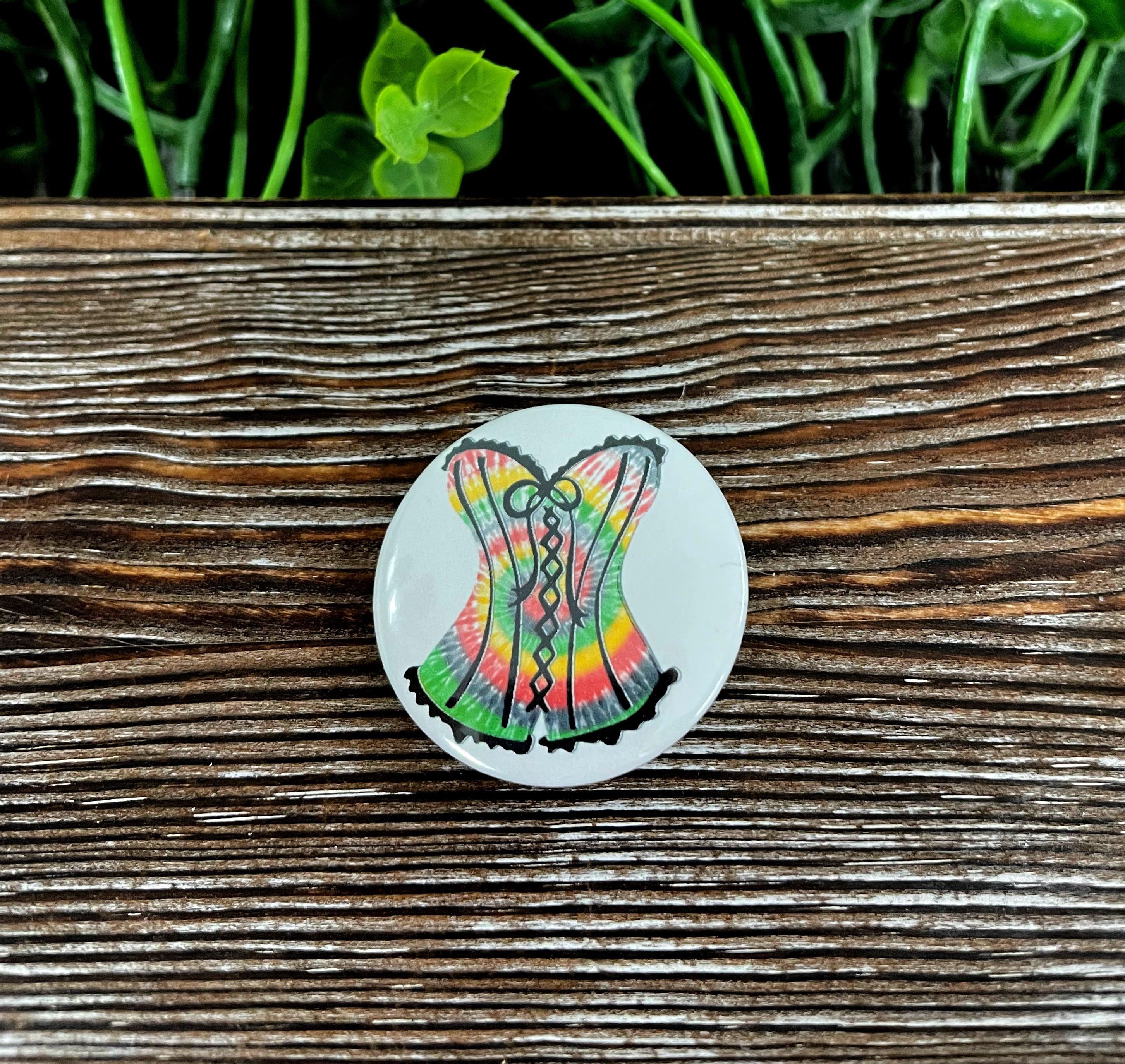 Colorful Tie Dye Sexy Laced Corset Button, 1.25 inches, featuring a vibrant design perfect for personalizing bags and accessories.