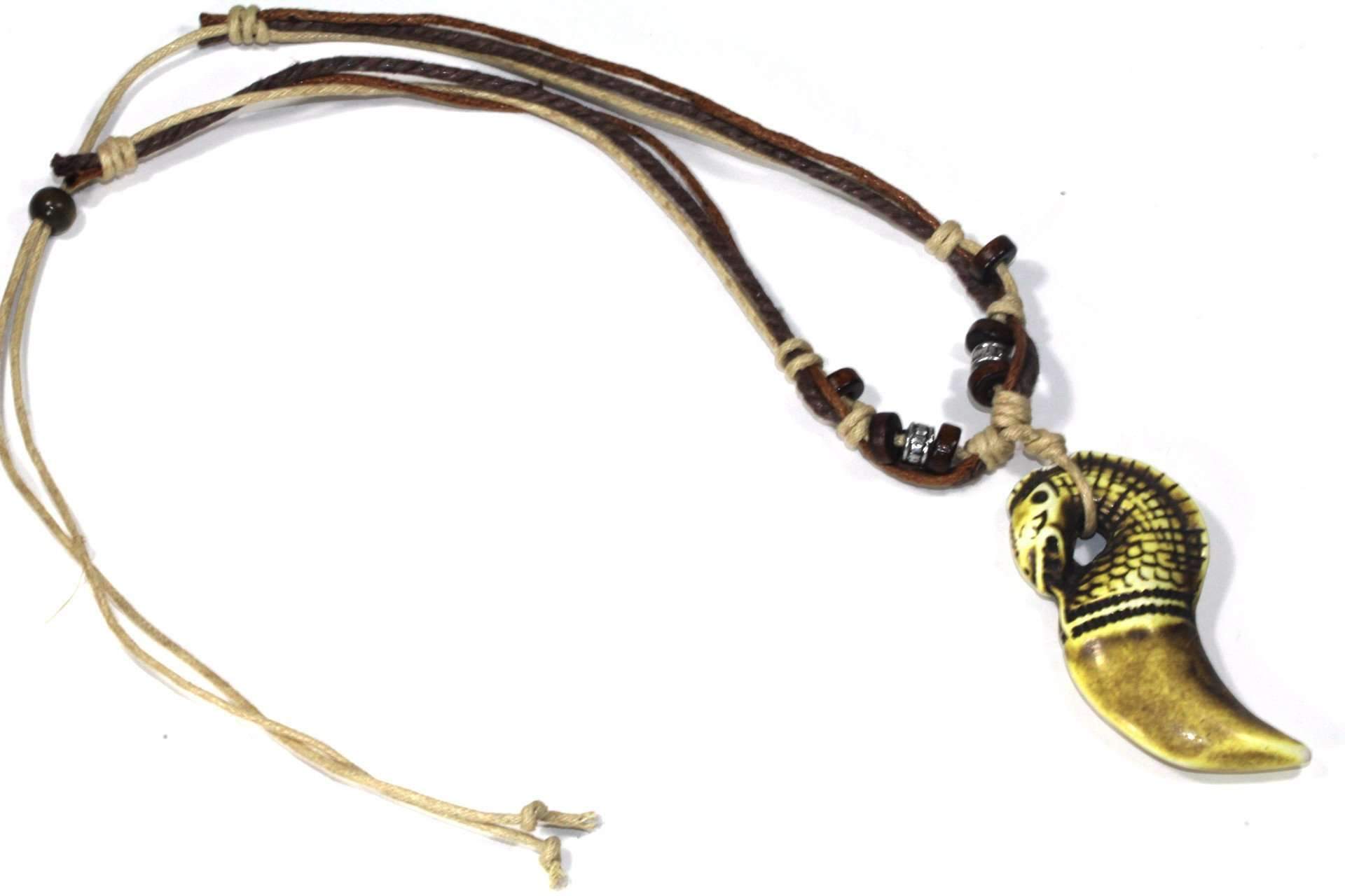 Tribal Serpent Head Boho Style Necklace featuring a tri-color cord, wooden beads, and an intricately carved serpent head pendant.