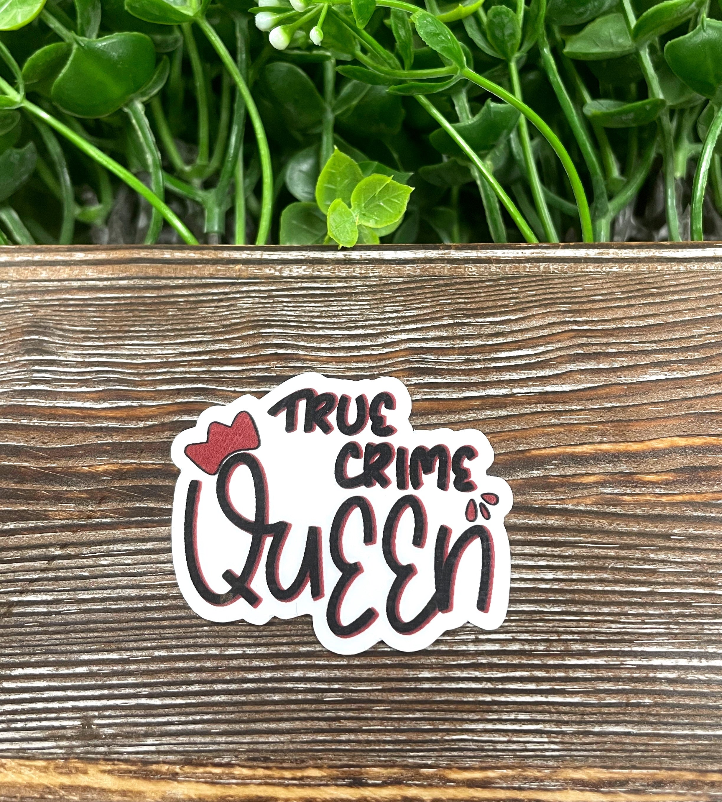 True Crime Queen die cut sticker featuring bold lettering and crime-themed graphics, perfect for personalizing your belongings.