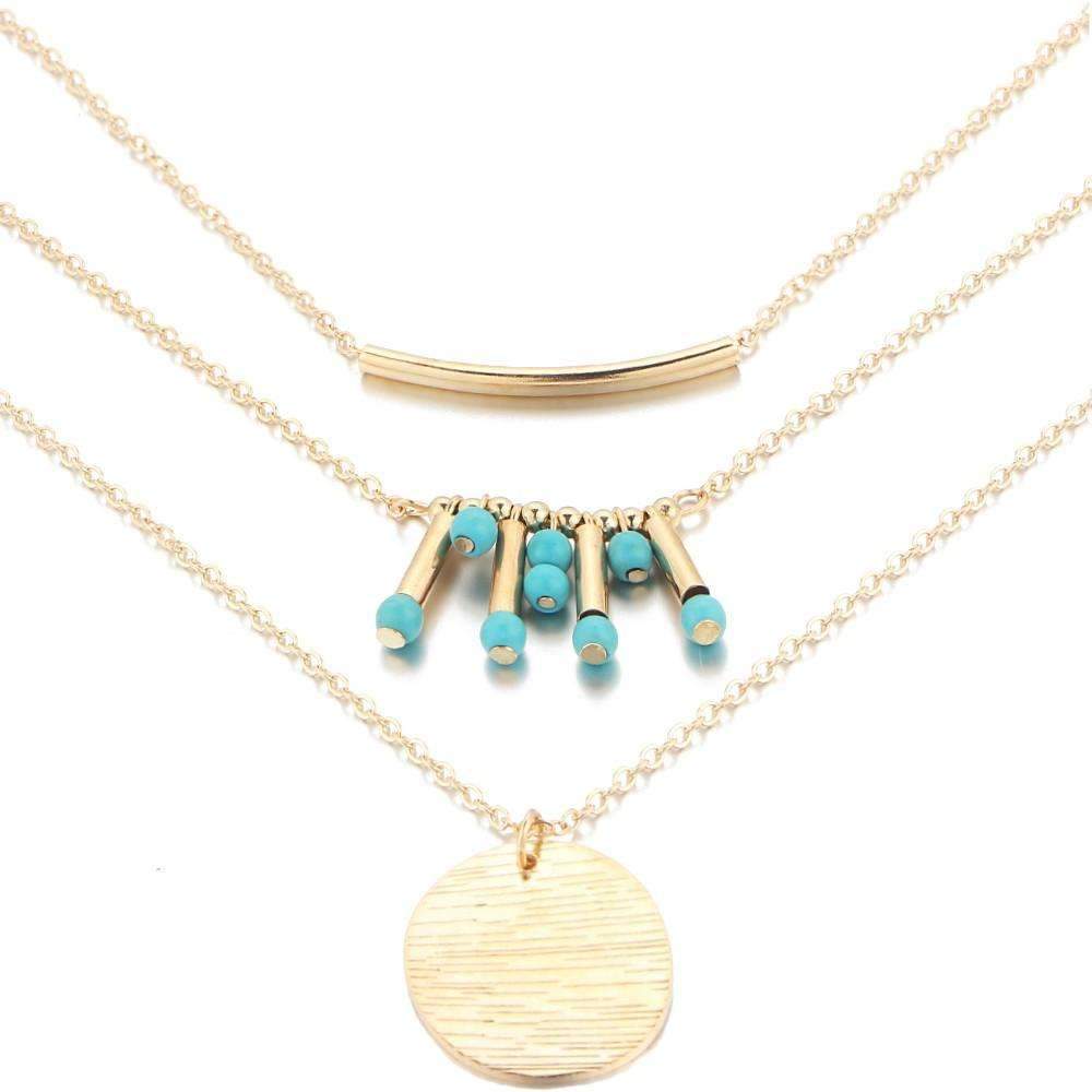 A beautiful turquoise multilayer necklace featuring three layers of turquoise beads and a high-quality zinc alloy chain, perfect for any outfit.