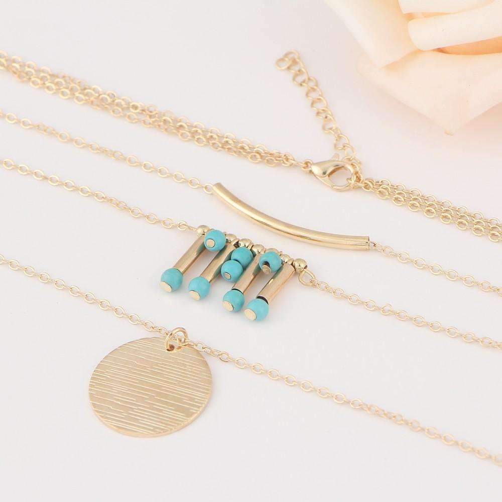 A beautiful turquoise multilayer necklace featuring three layers of turquoise beads and a high-quality zinc alloy chain, perfect for any outfit.