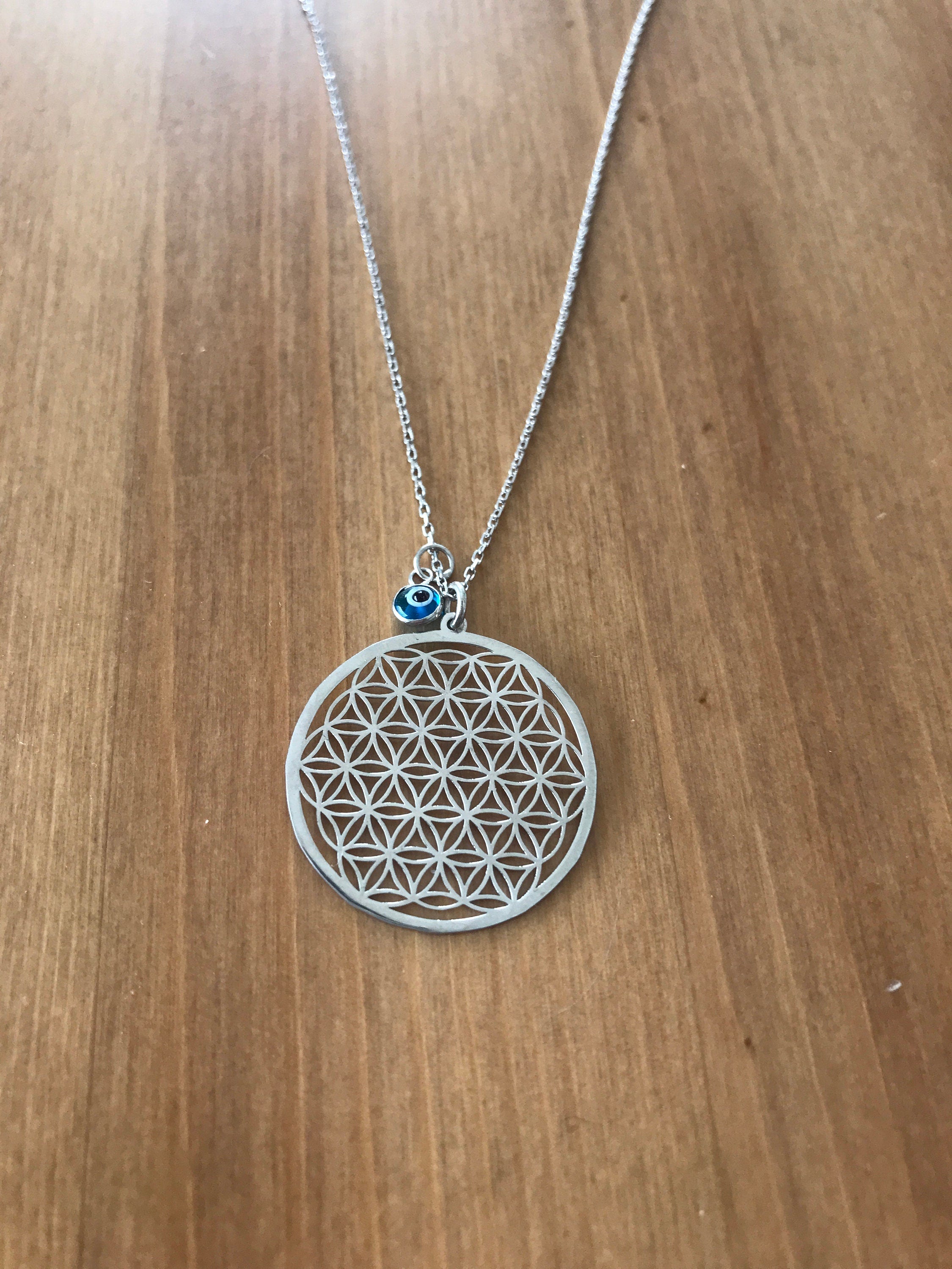 Unisex 925 Sterling Silver Flower of Life Necklace showcasing intricate design and high-quality craftsmanship.