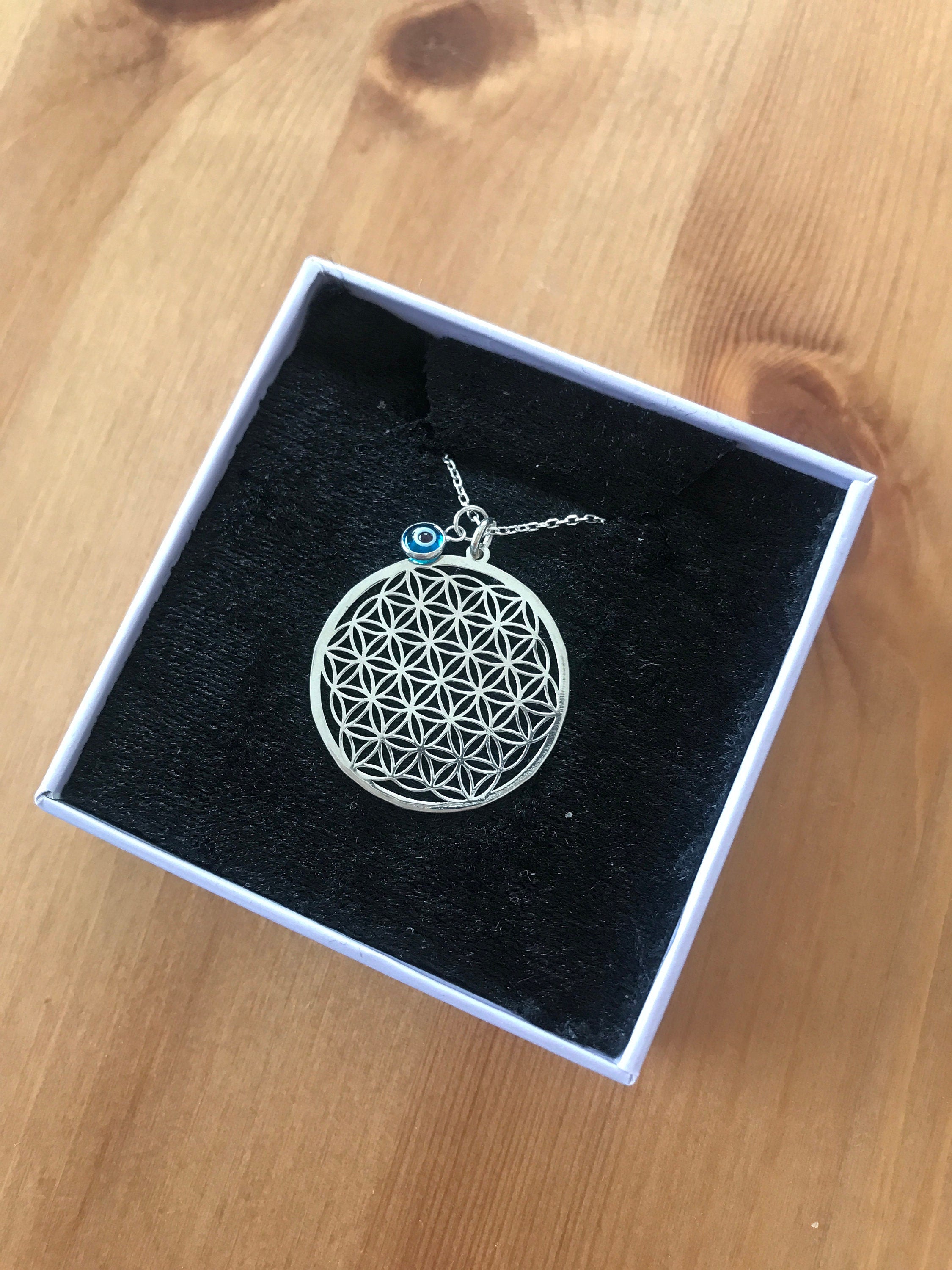 Unisex 925 Sterling Silver Flower of Life Necklace showcasing intricate design and high-quality craftsmanship.