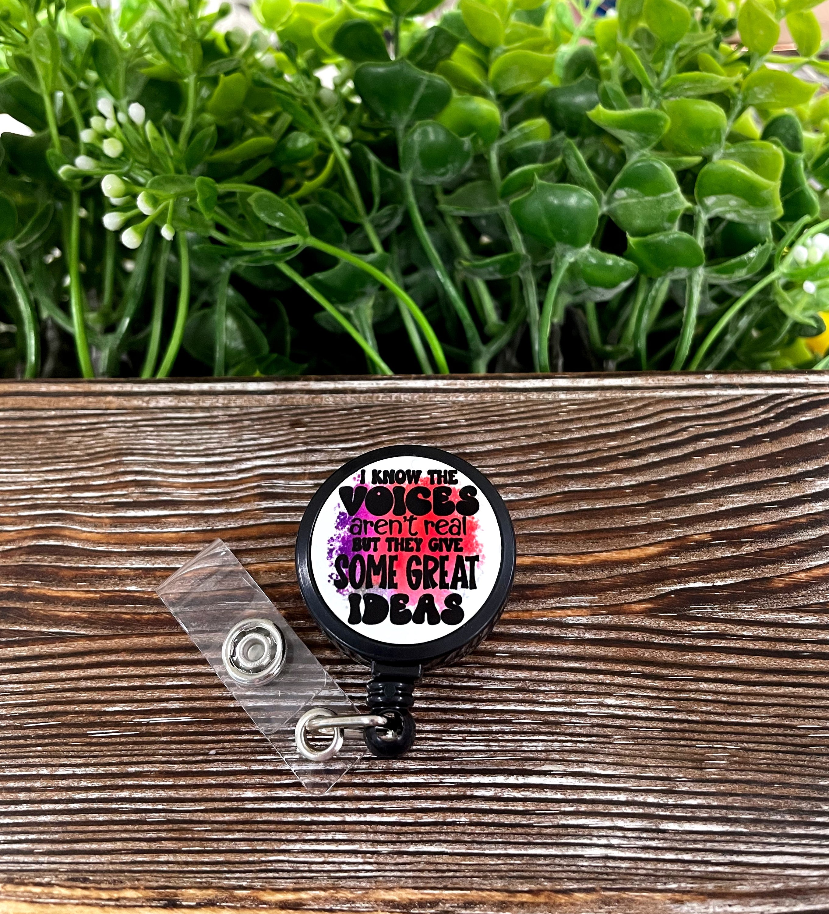 Colorful retractable badge reel featuring a Boho Fun design, measuring 1.2 inches in diameter with a 24-inch extension cord.