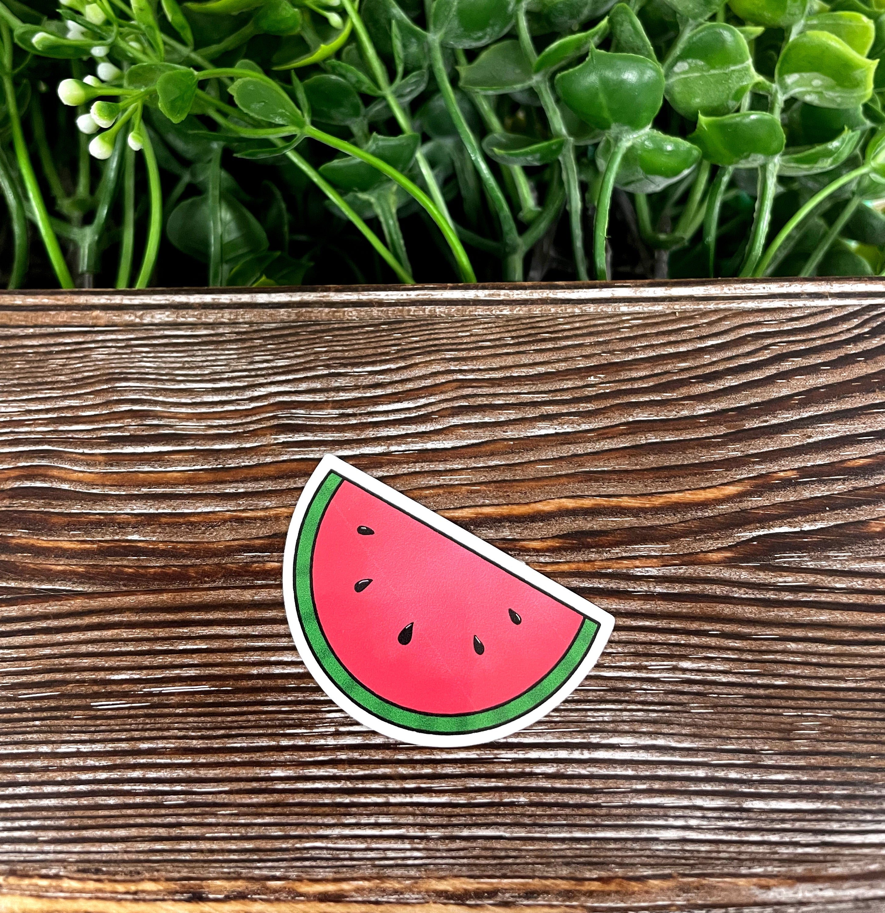 Colorful die cut sticker of a watermelon slice, showcasing vibrant colors and a fun design, perfect for personalizing various items.