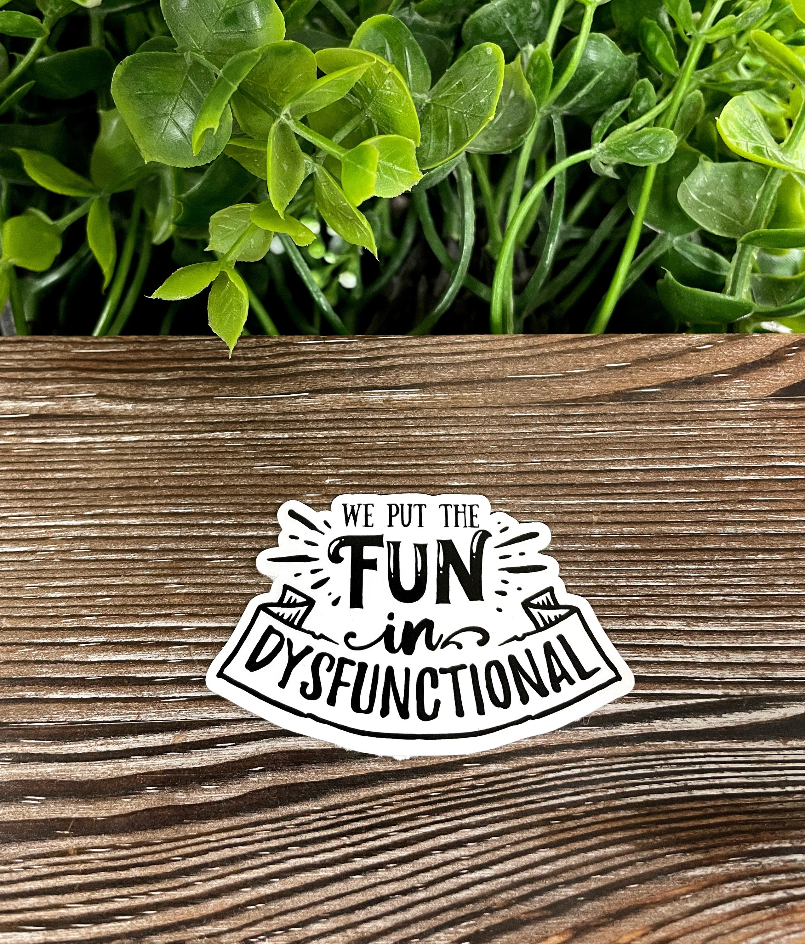 Colorful die cut vinyl sticker with the phrase 'We Put the Fun in Dysfunctional', showcasing a boho design.