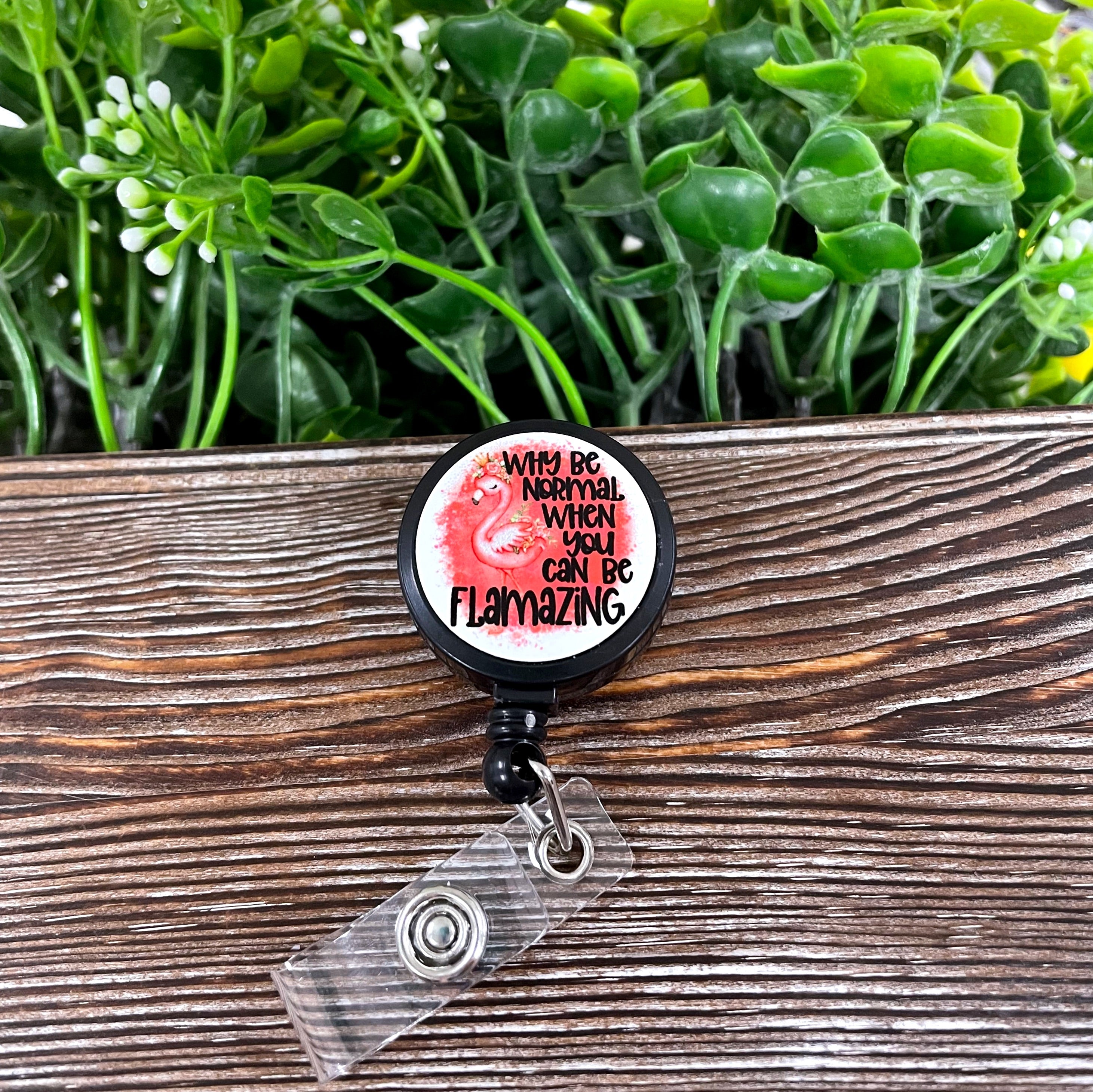 Flamazing retractable badge reel featuring a vibrant design on a metal blank attached to a plastic reel, measuring 1.2 inches in diameter.