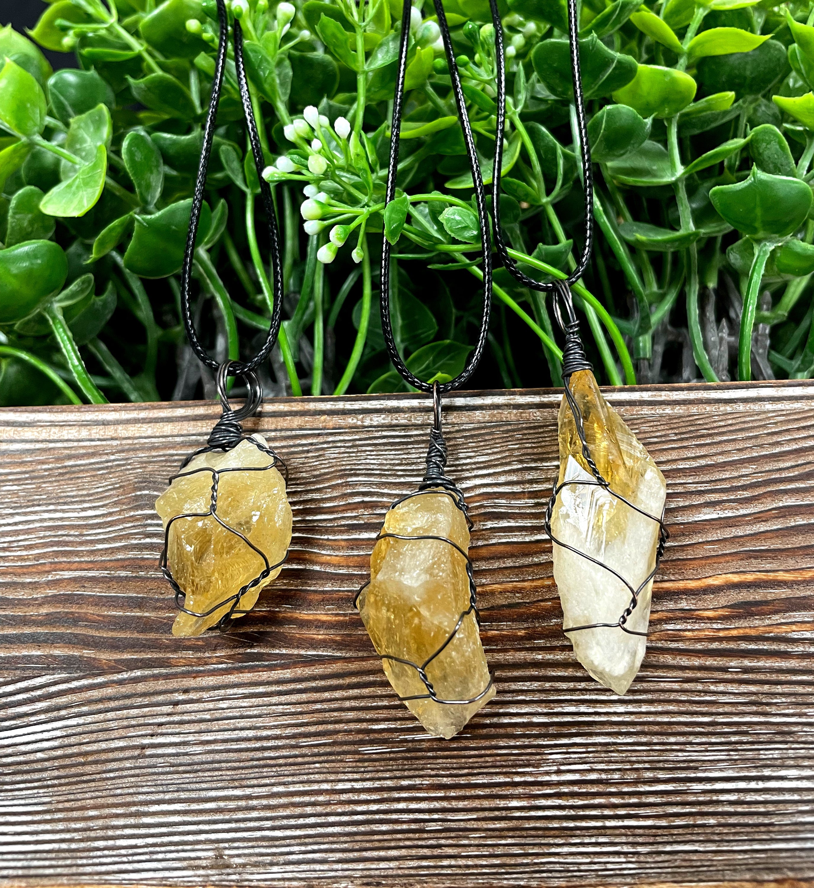 Wire Wrapped Rough Citrine Crystal Gemstone Chunk Pendant with oxidized copper wire on a 21-inch cord, showcasing its unique design and antique finish.