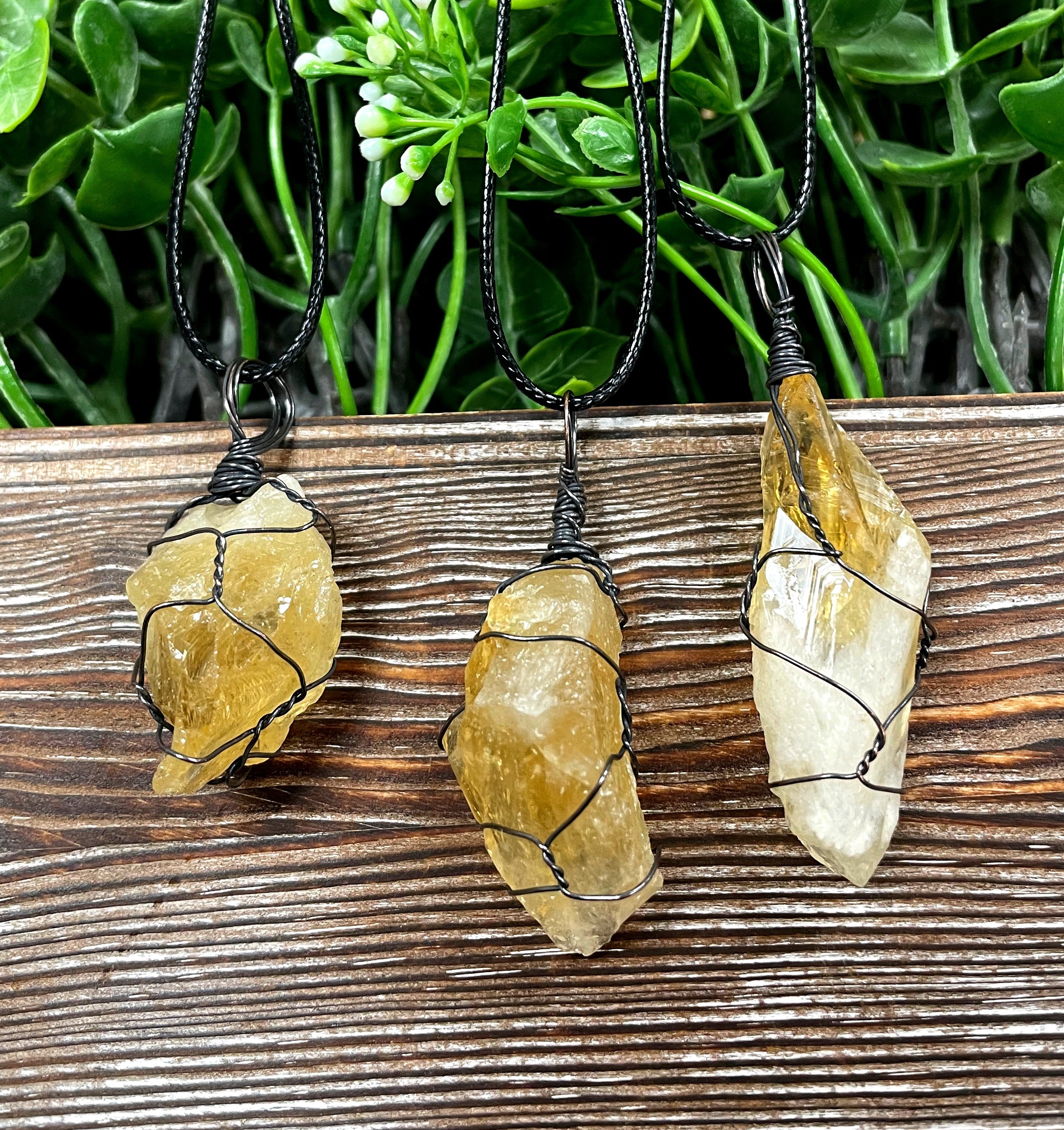 Wire Wrapped Rough Citrine Crystal Gemstone Chunk Pendant with oxidized copper wire on a 21-inch cord, showcasing its unique design and antique finish.