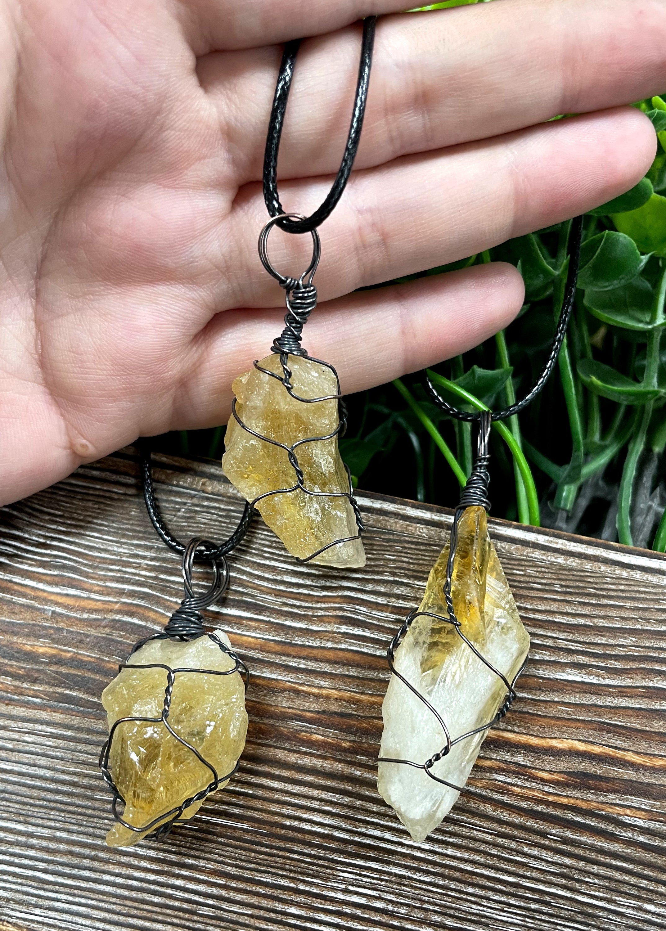 Wire Wrapped Rough Citrine Crystal Gemstone Chunk Pendant with oxidized copper wire on a 21-inch cord, showcasing its unique design and antique finish.