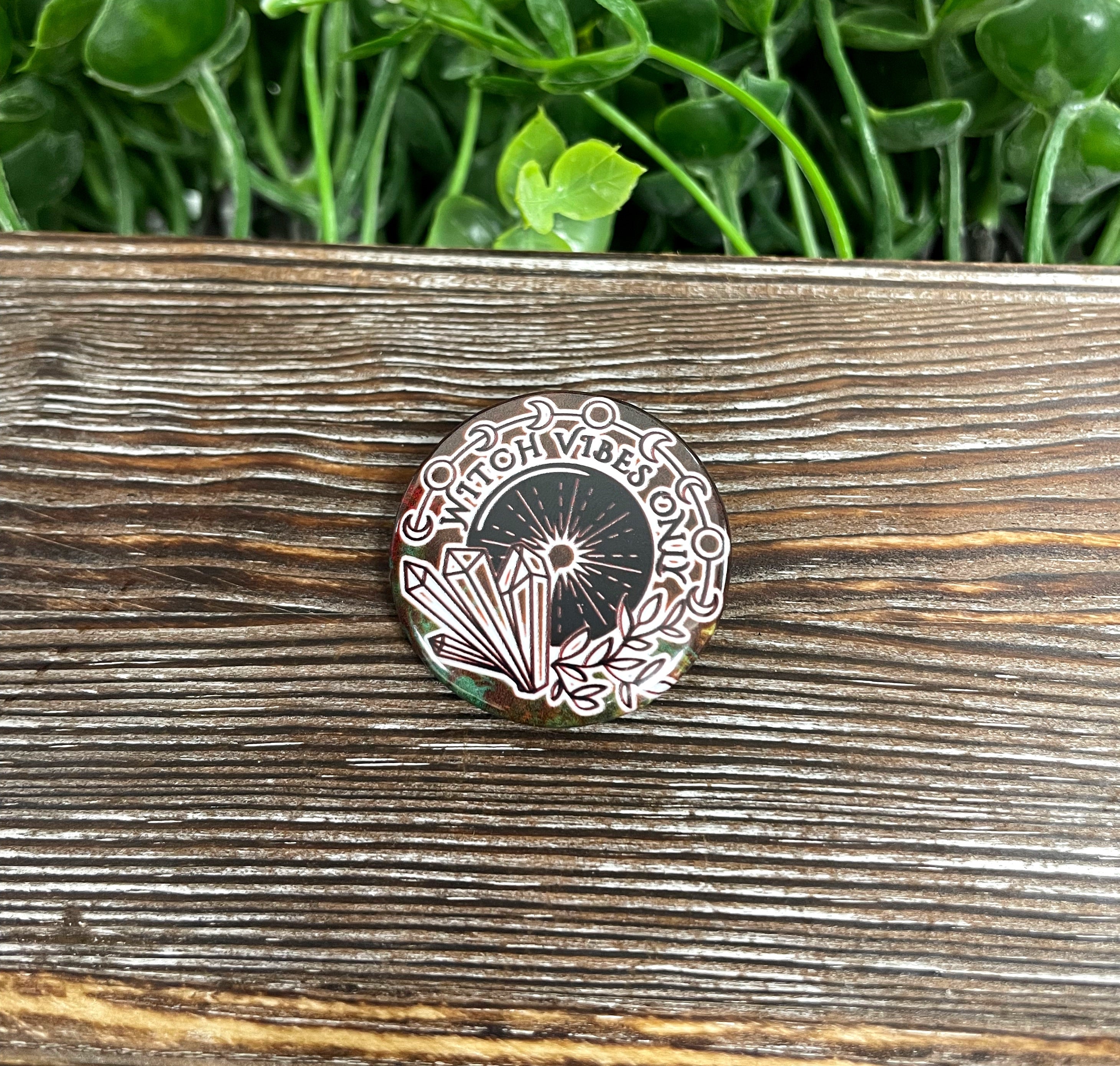 Witch Vibes Only graphic art button, 1.25 inches, featuring a black and brown design, perfect for personalizing bags and accessories.