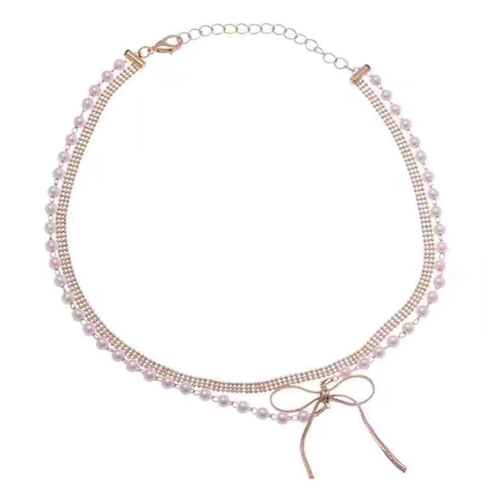 Women's Layered Look Necklace featuring faux pearls and a bow, elegantly designed with a multi ball chain.