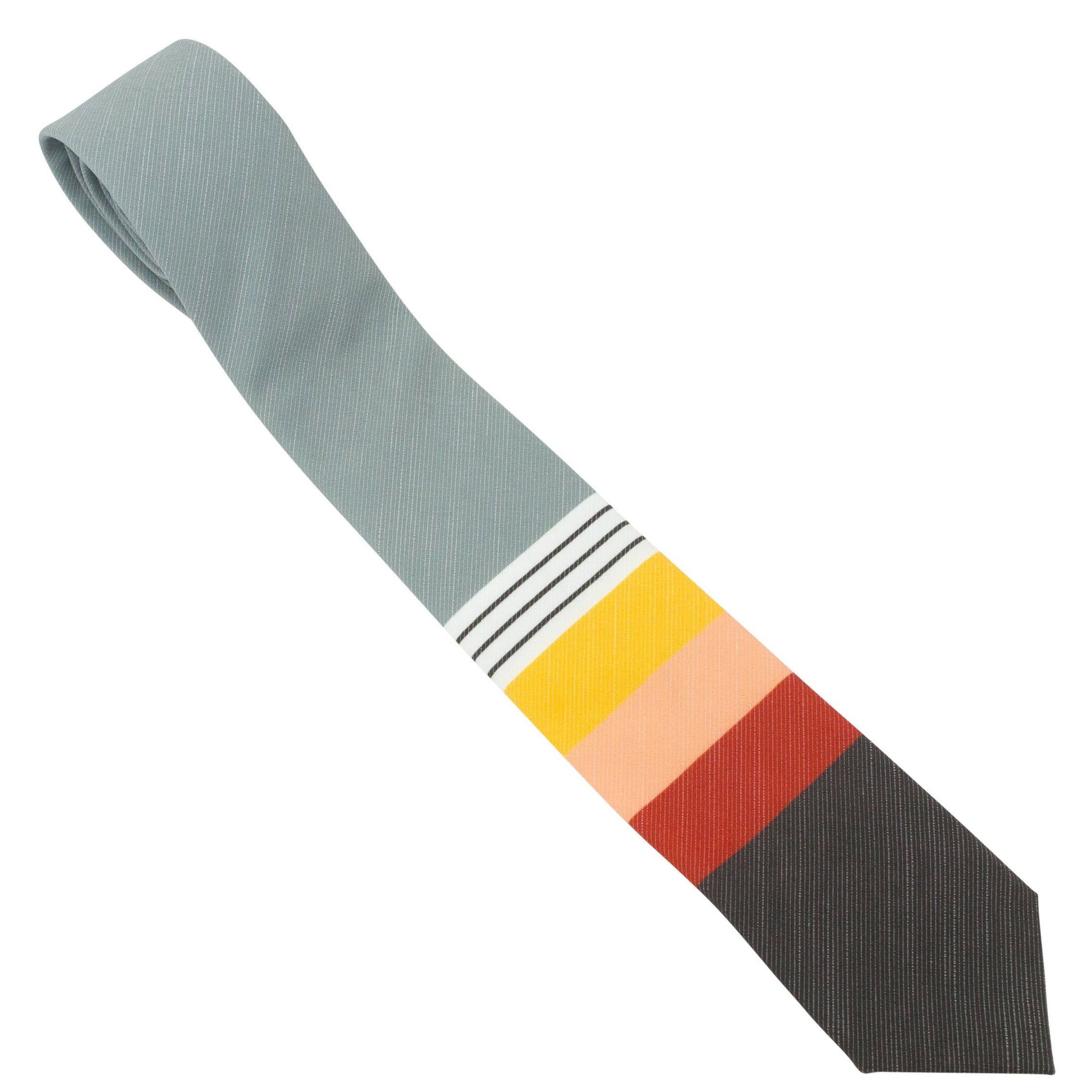 A vibrant 70's Sunset Colorblock Tie featuring mustard yellow, peach, and red colors, made from boardshort material.