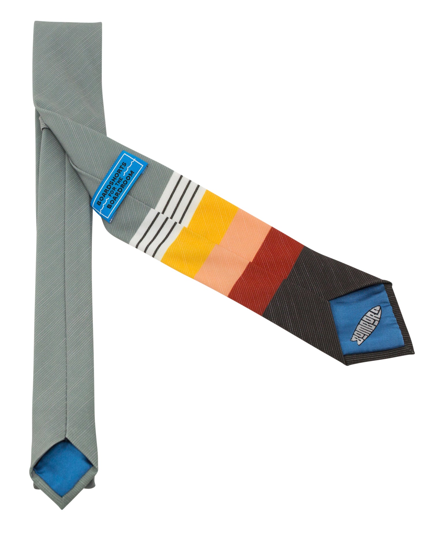 A vibrant 70's Sunset Colorblock Tie featuring mustard yellow, peach, and red colors, made from boardshort material.