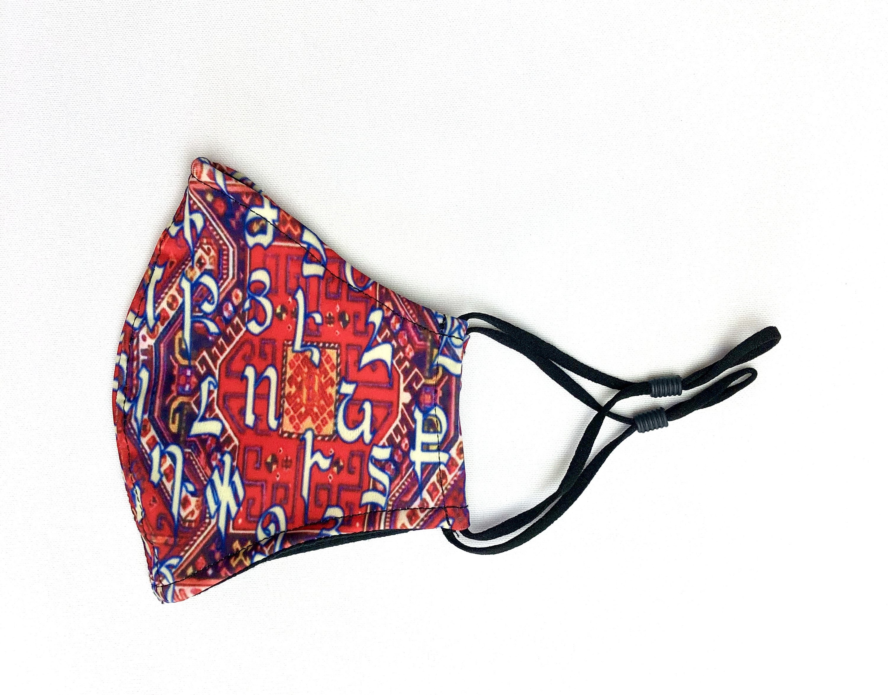 Armenian Alphabet Red Face Mask with adjustable ear loops and contoured nose wire, showcasing vibrant design.