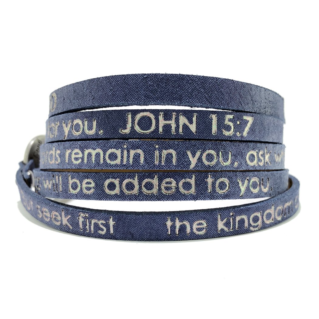 Stardust Navy Bible Verse Wrap Around bracelet featuring Matthew 6:33 and John 15:7, made of leather with a custom buckle.