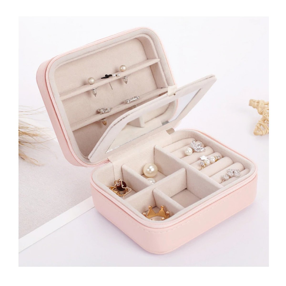 Cool Jewels Palm Sized Compact Jewelry Box in Powder Pink and Sky Blue, featuring vegan leather exterior and suede lining, designed for earrings, rings, and bracelets.