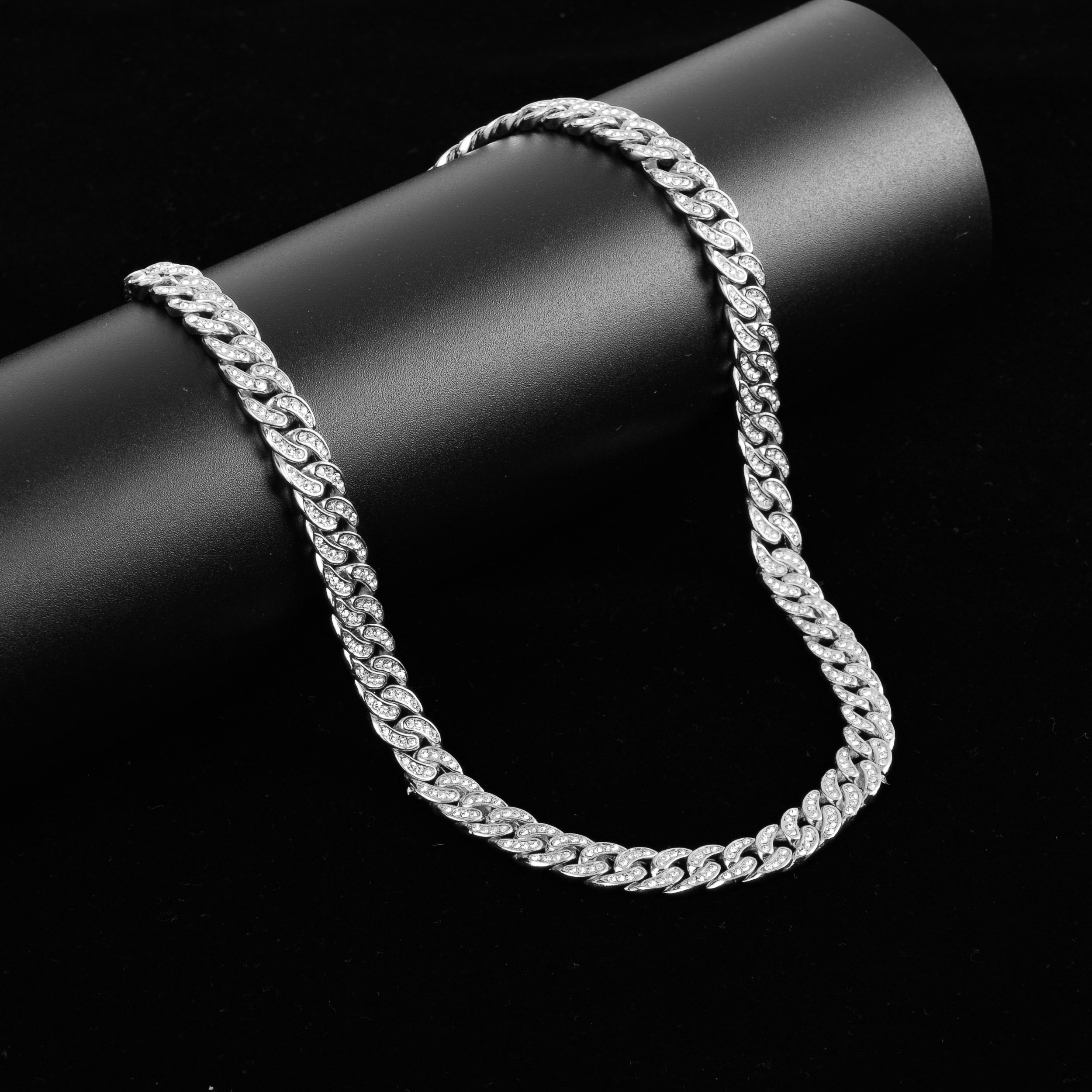 CREW 8 MM Cuban Chain featuring rhinestone crystals, solid brass material, and a fold-over clasp, elegantly displayed on a neutral background.