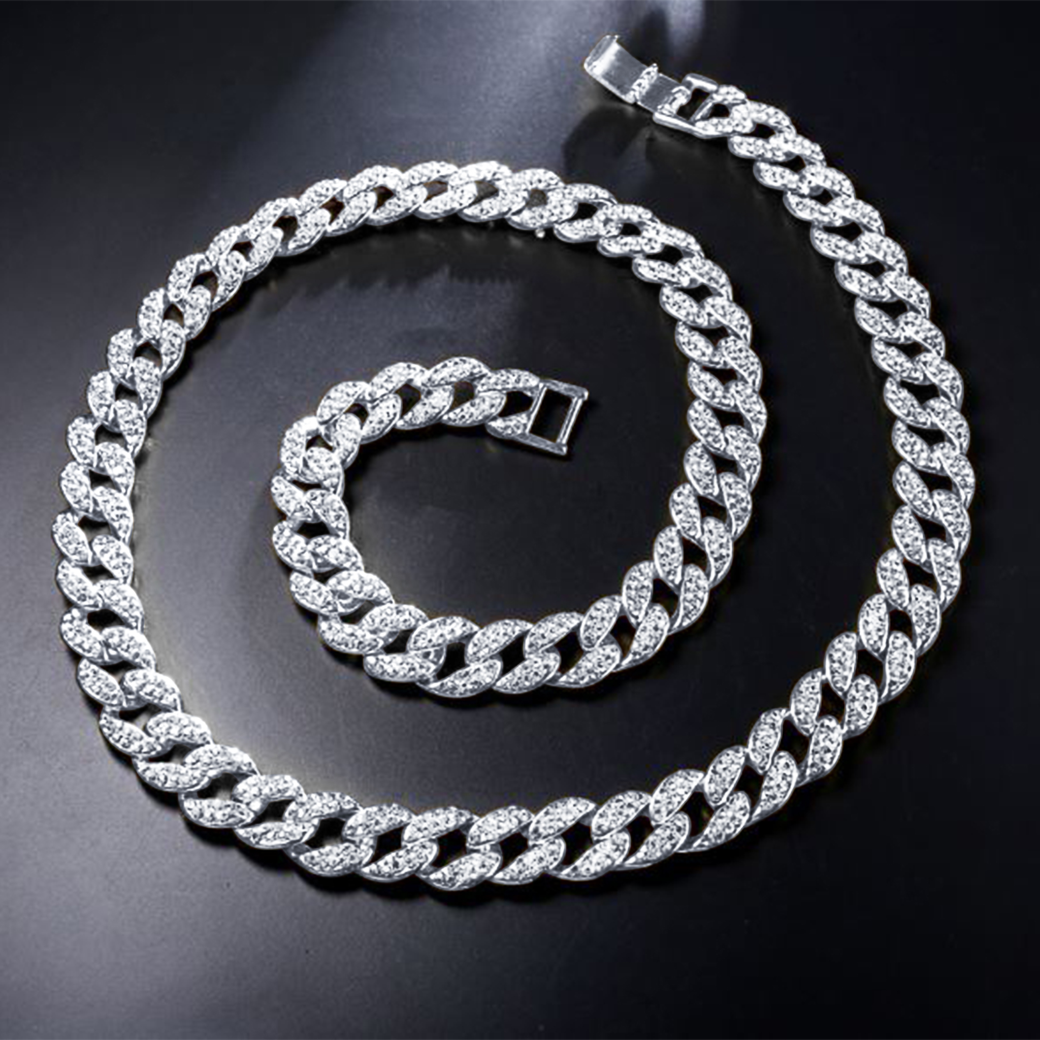 CREW 8 MM Cuban Chain featuring rhinestone crystals, solid brass material, and a fold-over clasp, elegantly displayed on a neutral background.