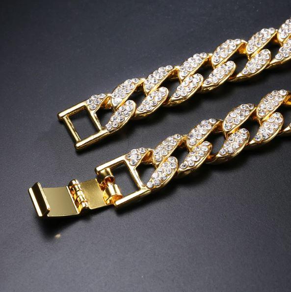 CREW BM 18 MM Cuban Chain featuring rhinestone crystals, solid brass material, and a fold-over clasp, elegantly displayed against a neutral background.