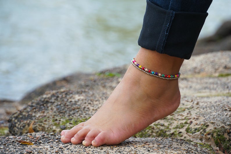 Fancy Dual Band Boho Silver Anklet featuring silver bells and pressed cotton chords, handcrafted by Thai artisans.